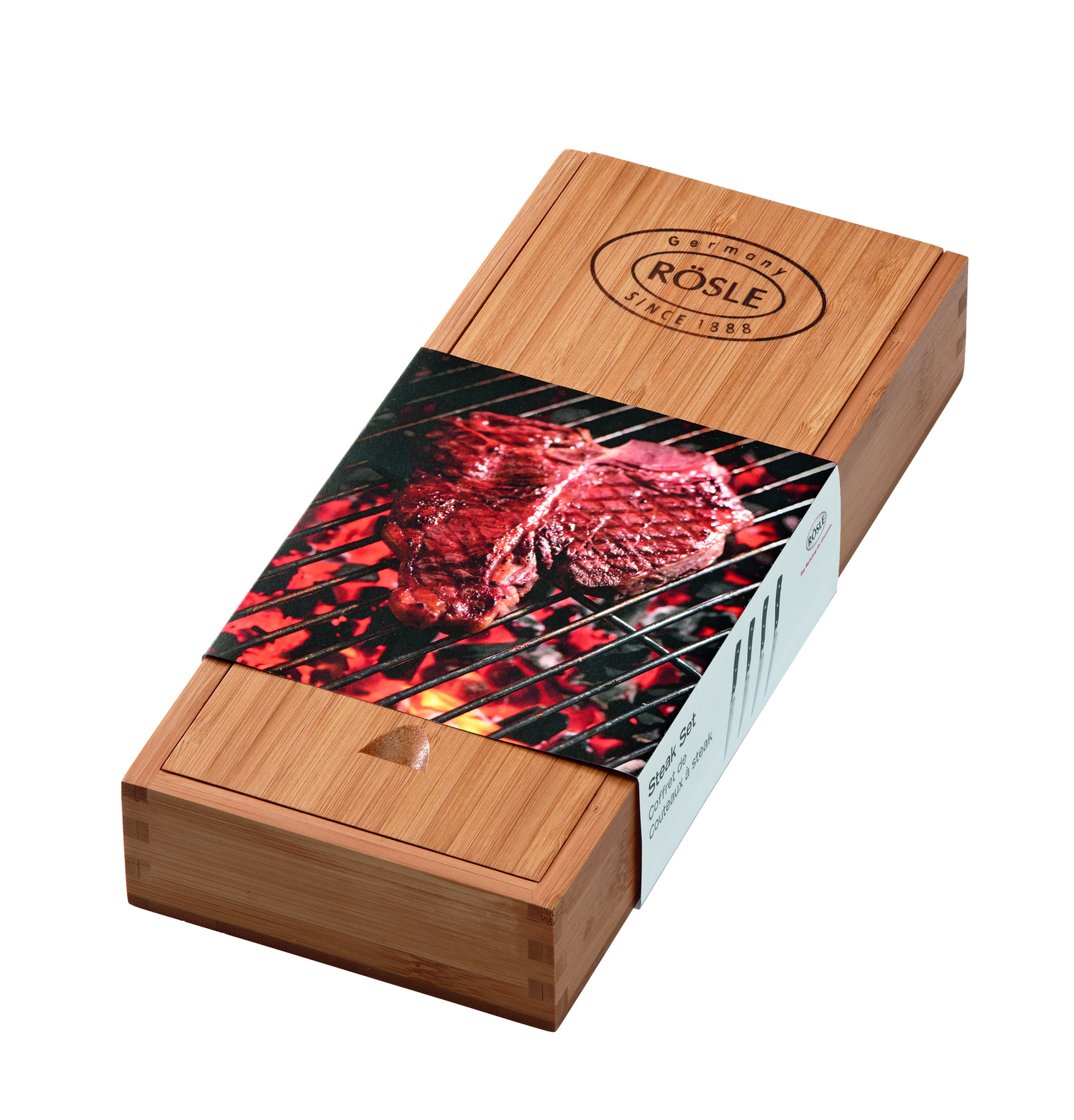 Eine Holzbox enthält ein Steak-Set. Der Deckel zeigt ein gegrilltes Steak-Bild.