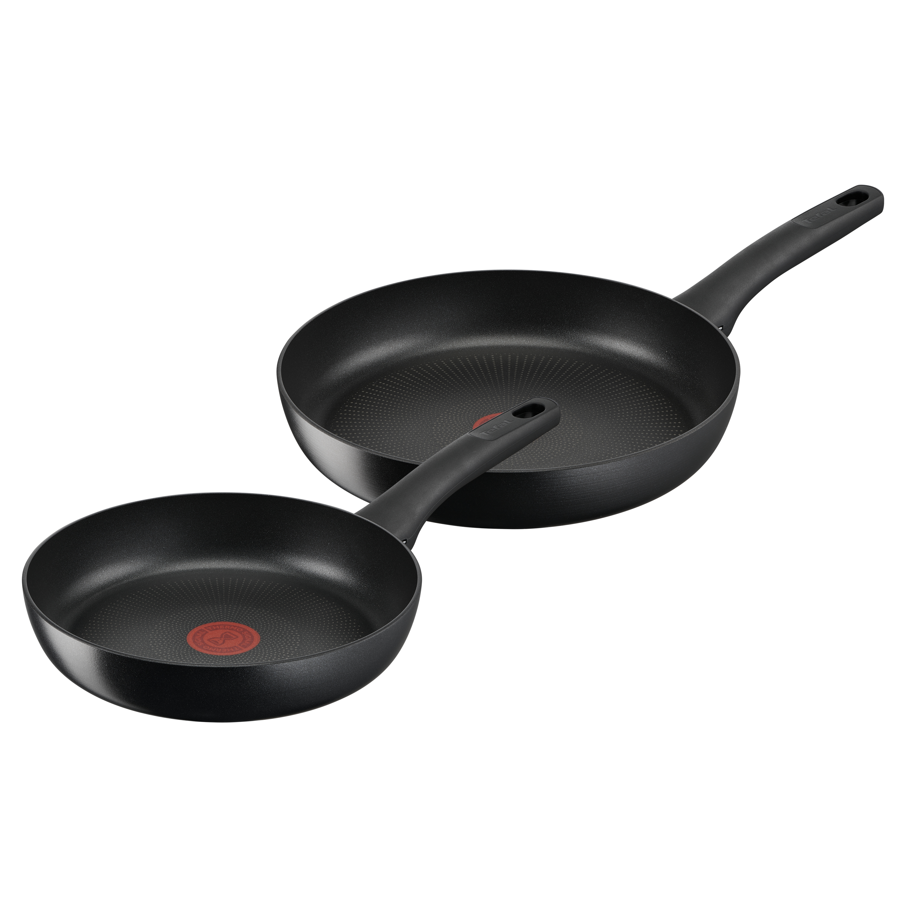 Dwie czarne patelnie Tefal z czarnymi uchwytami, jedna mniejsza od drugiej.
