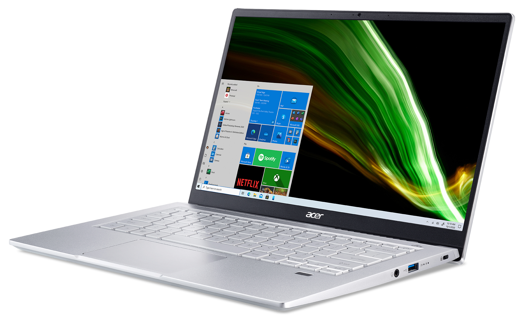 Zilveren laptop met open scherm, met Windows-interface met groene achtergrond, op een wit oppervlak.