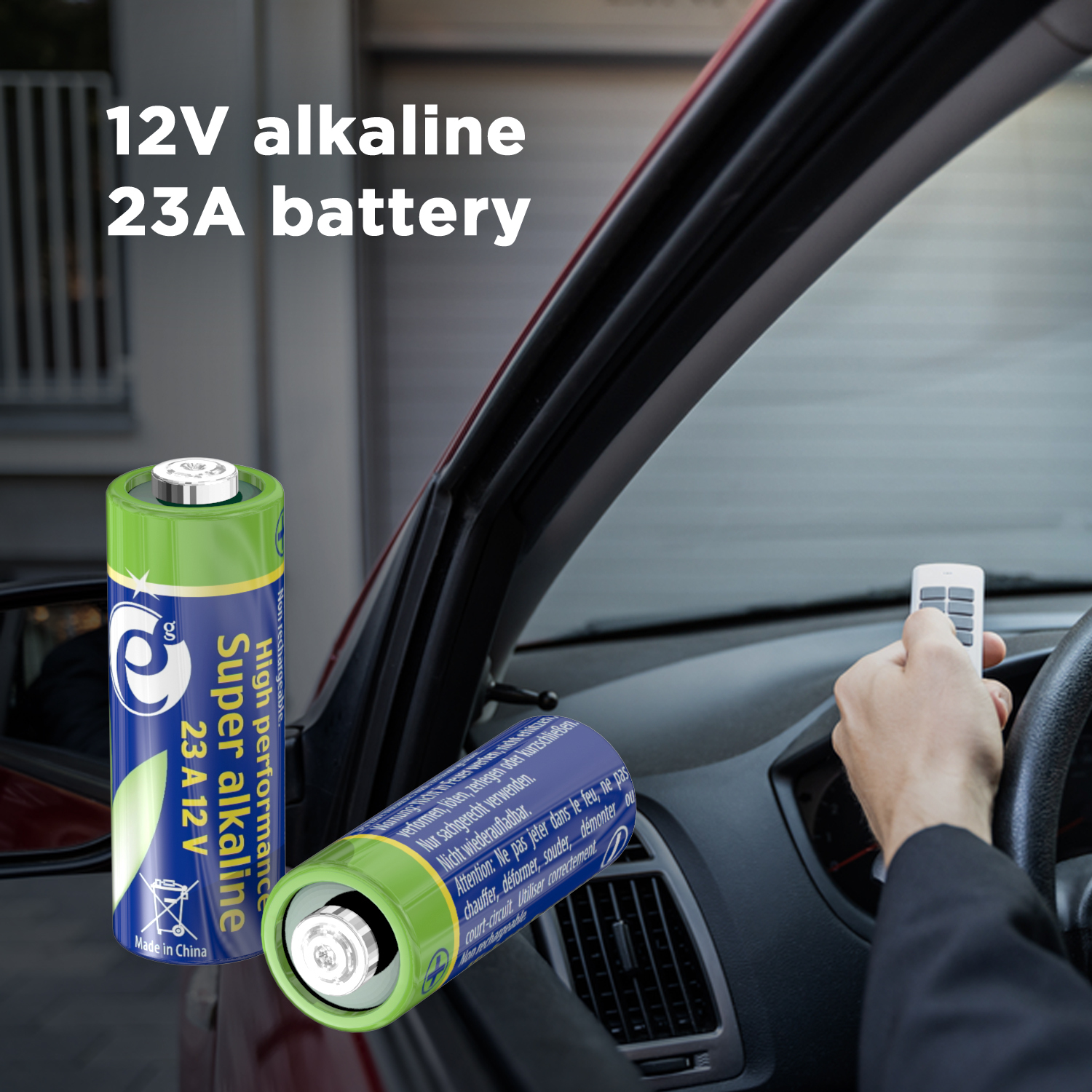 Dwie cylindryczne baterie z napisem 'Super alkaline' i '23A 12V'. Wnętrze samochodu w tle.
