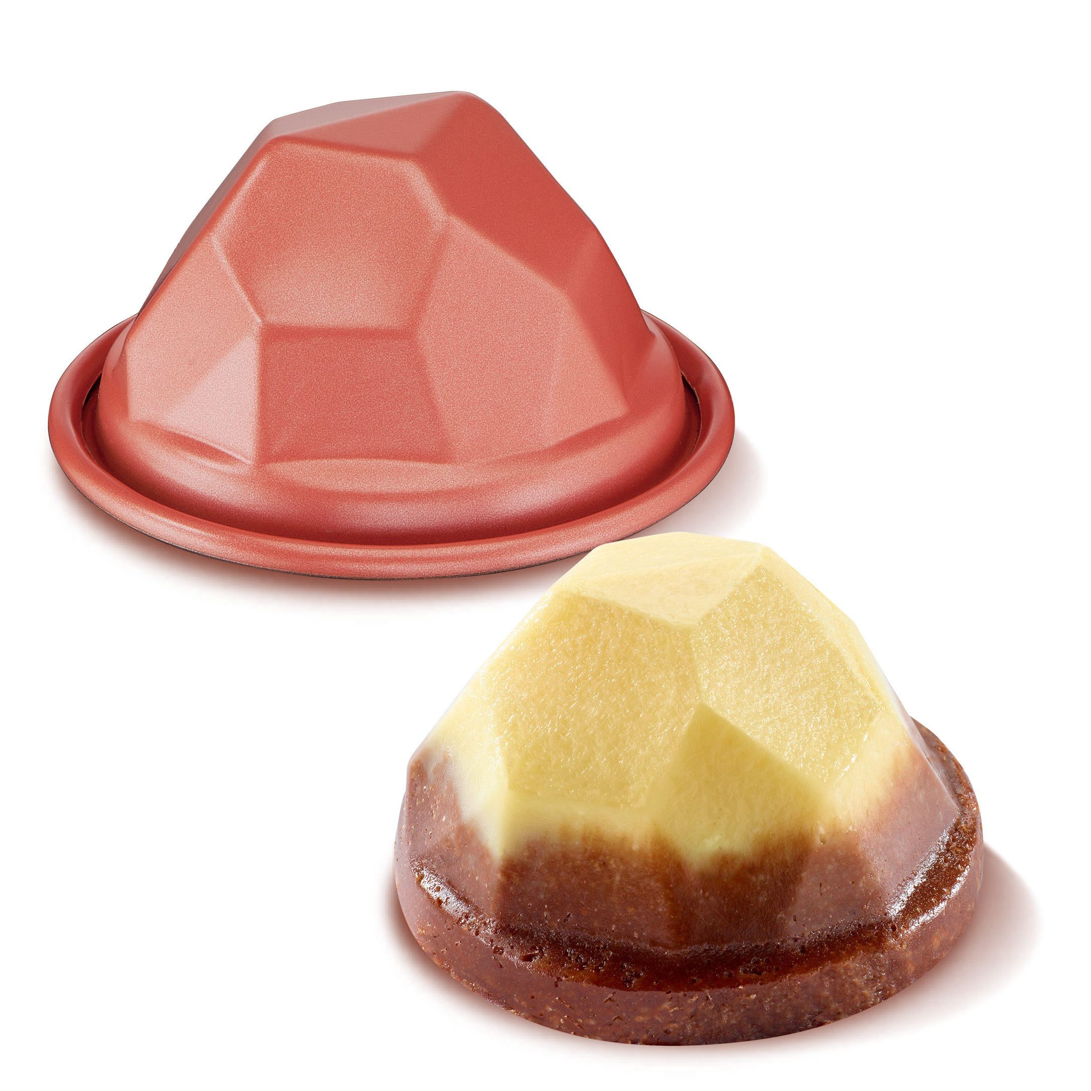 Dwie formy w kształcie diamentu, jedna różowa, druga wypełniona żółtymi i brązowymi warstwami.