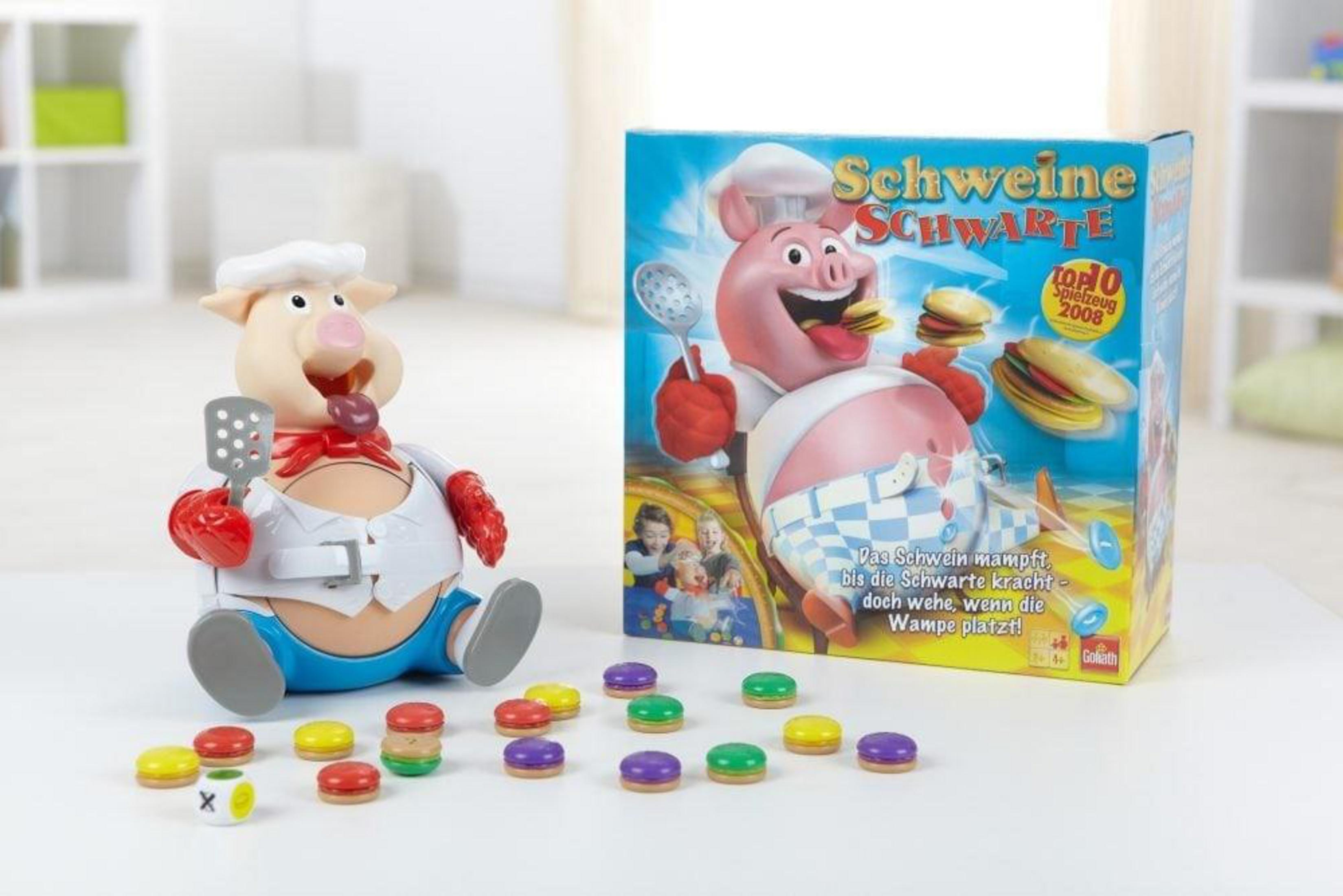 Ein Schweinekoch-Brettspiel mit einem Schweinecharakter, Spielbrett und Spielsteinen.