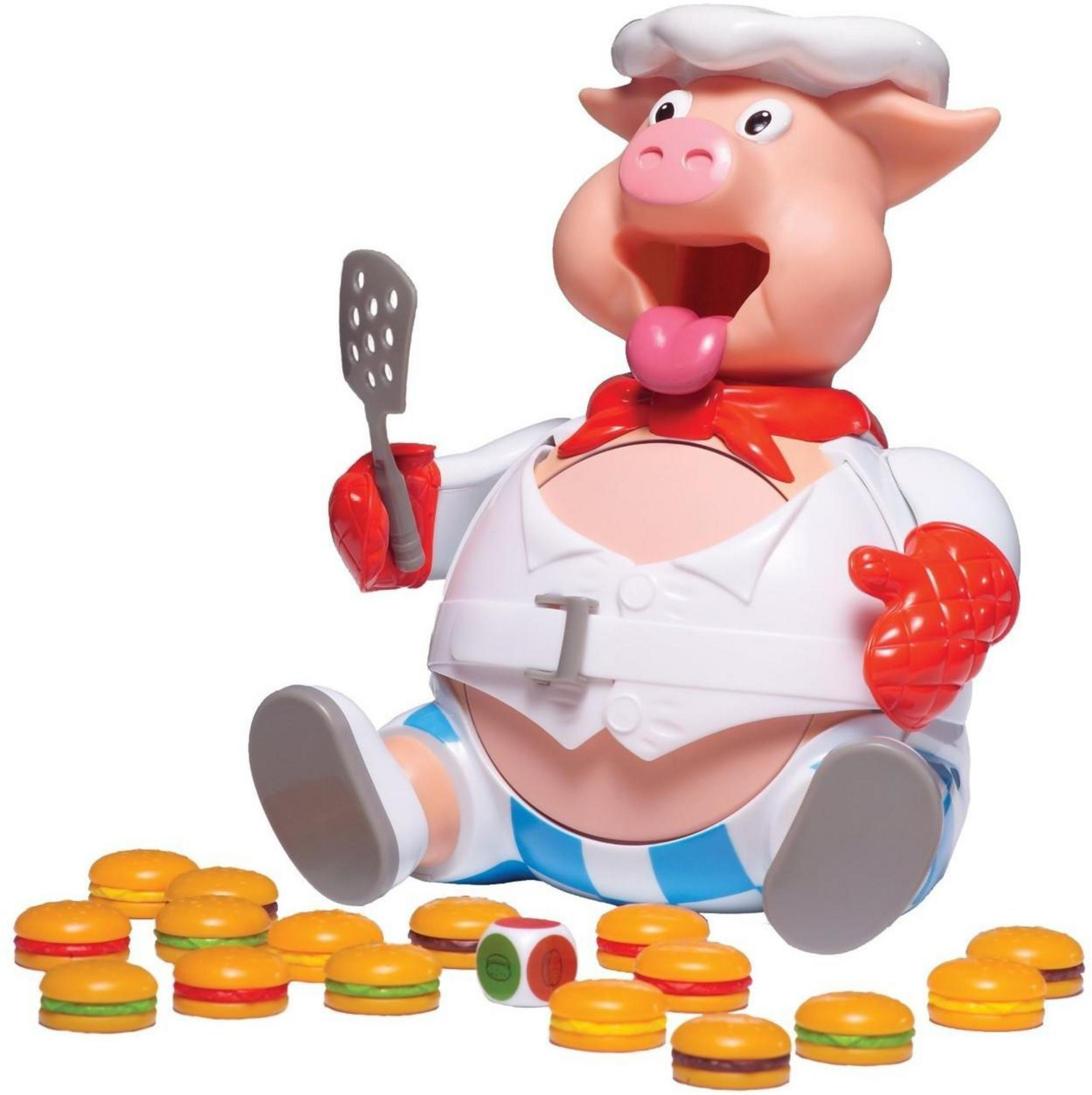 Spielzeugschwein mit Kochmütze, hält einen Spatel, und Mund offen. Burger und Würfel sind vorne.