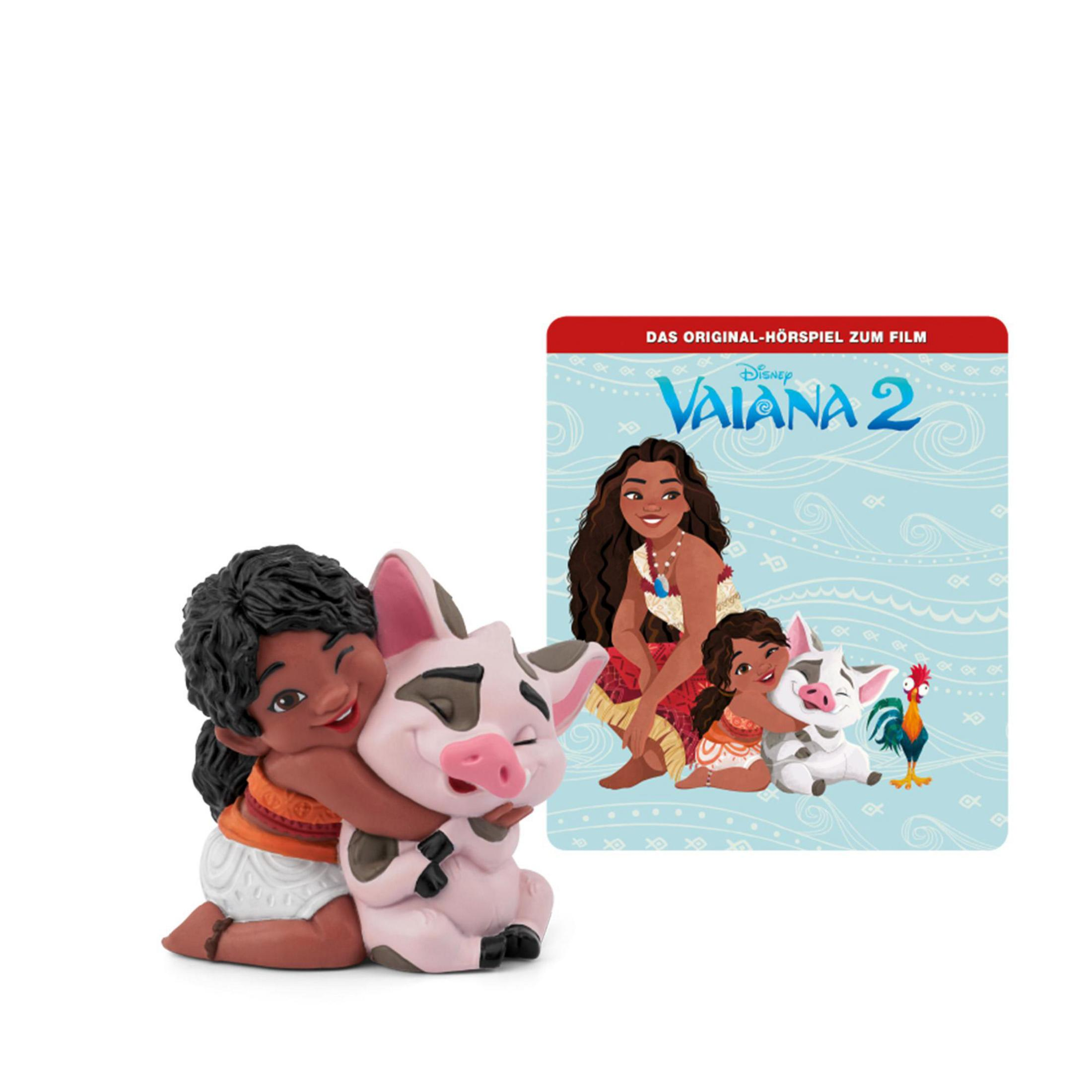 Figur eines Mädchens, das ein Schwein umarmt, und ein Filmcover. Weißer Hintergrund.