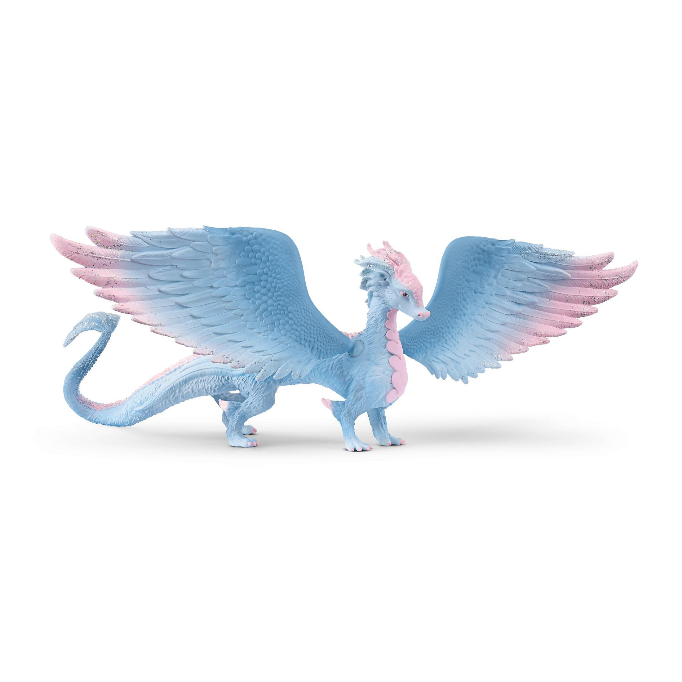 Un giocattolo a forma di drago blu con ali rosa, in piedi su una superficie bianca, ali spalancate.