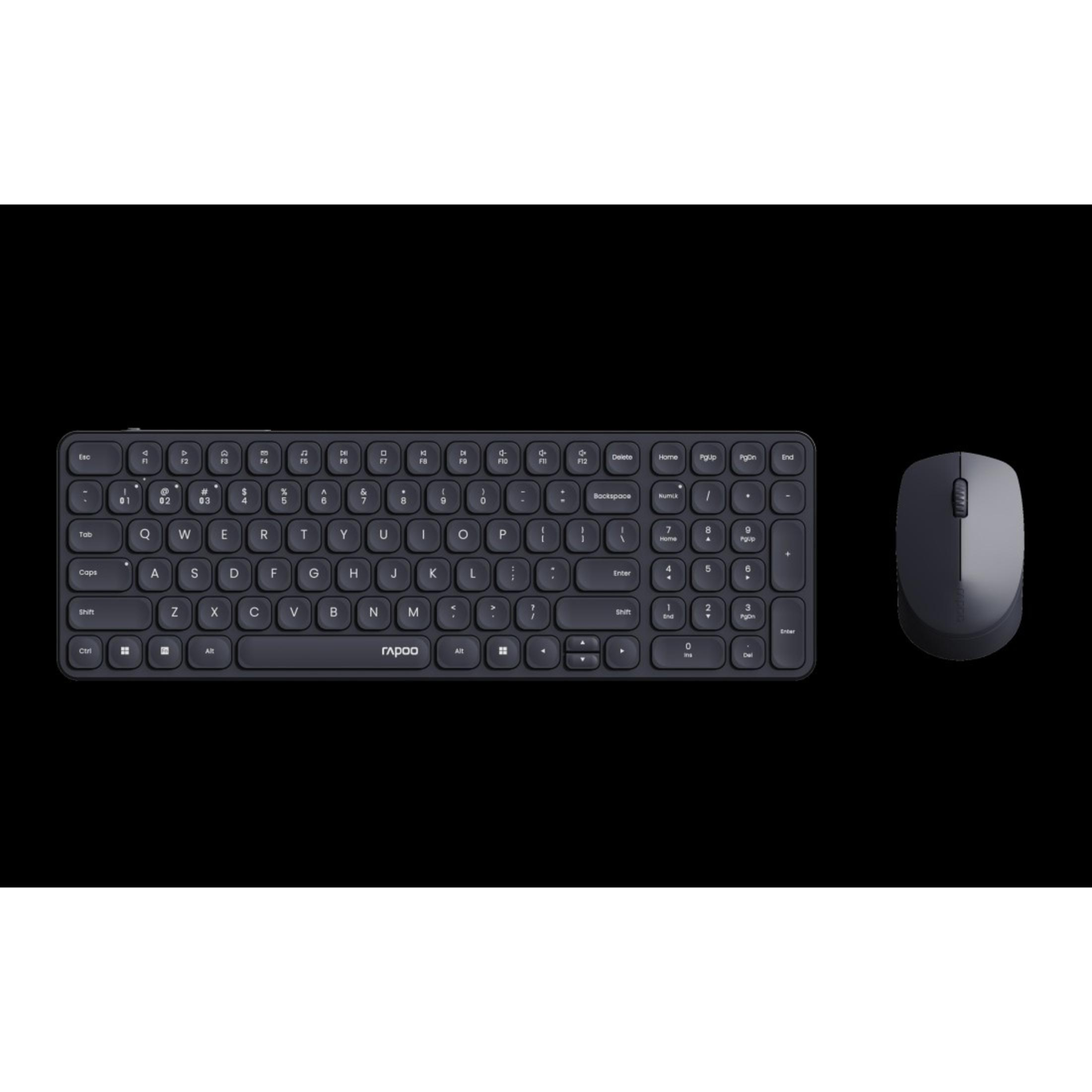 Czarny bezprzewodowy zestaw klawiatury i myszy na ciemnej powierzchni. Klawiatura z białymi klawiszami, mysz po prawej.