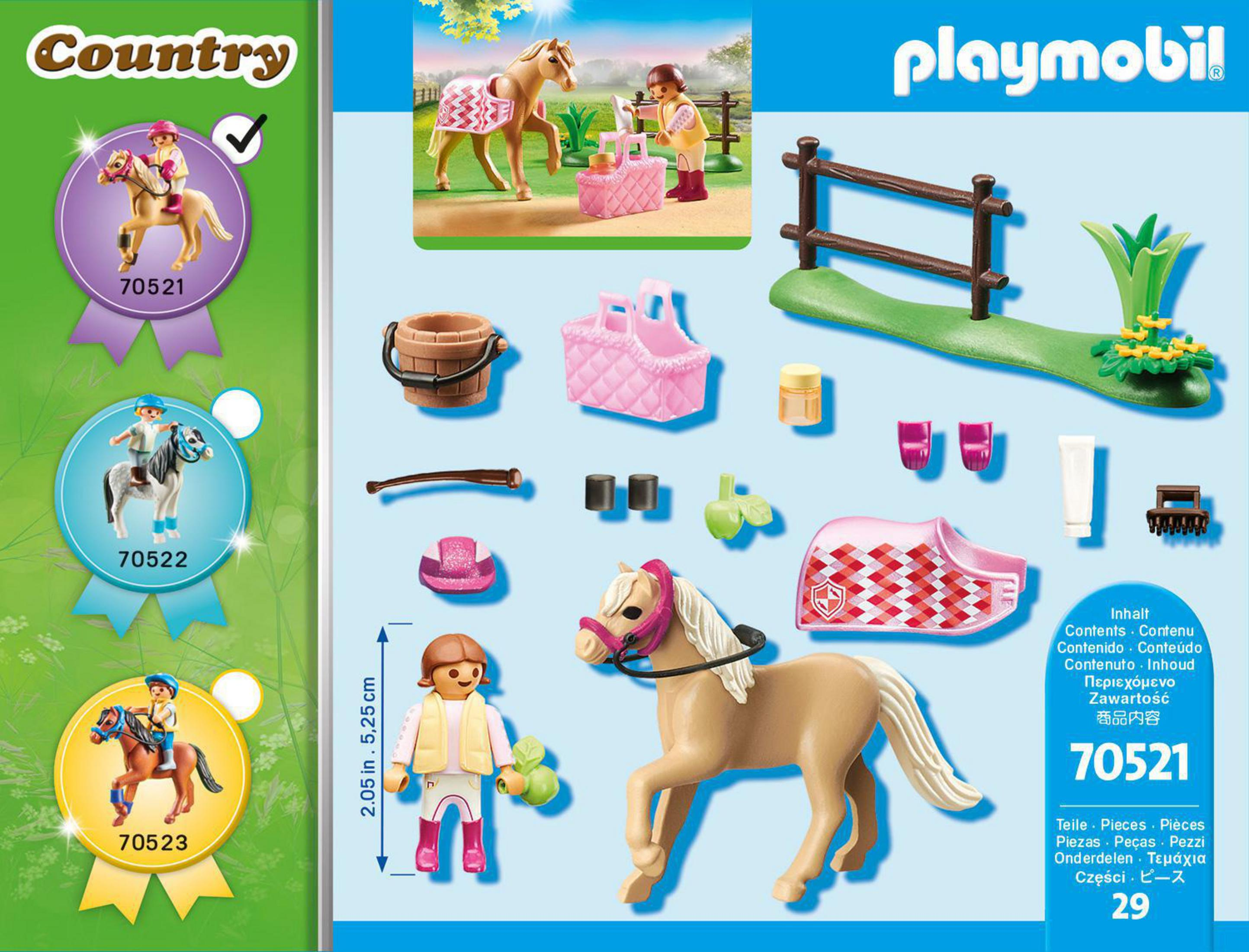 Zestaw Playmobil z koniem, jeźdźcem i akcesoriami, w tym płotami i koszem.