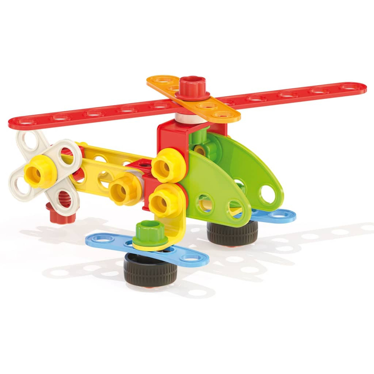 Kolorowy helikopter zabawkowy z plastikowych elementów. Białe tło.