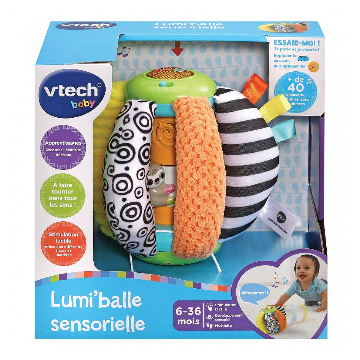 Zabawka dla niemowląt Vtech. Jest to miękka piłka z kolorowymi fakturami i uśmiechniętym dzieckiem. Są tam teksty po francusku.