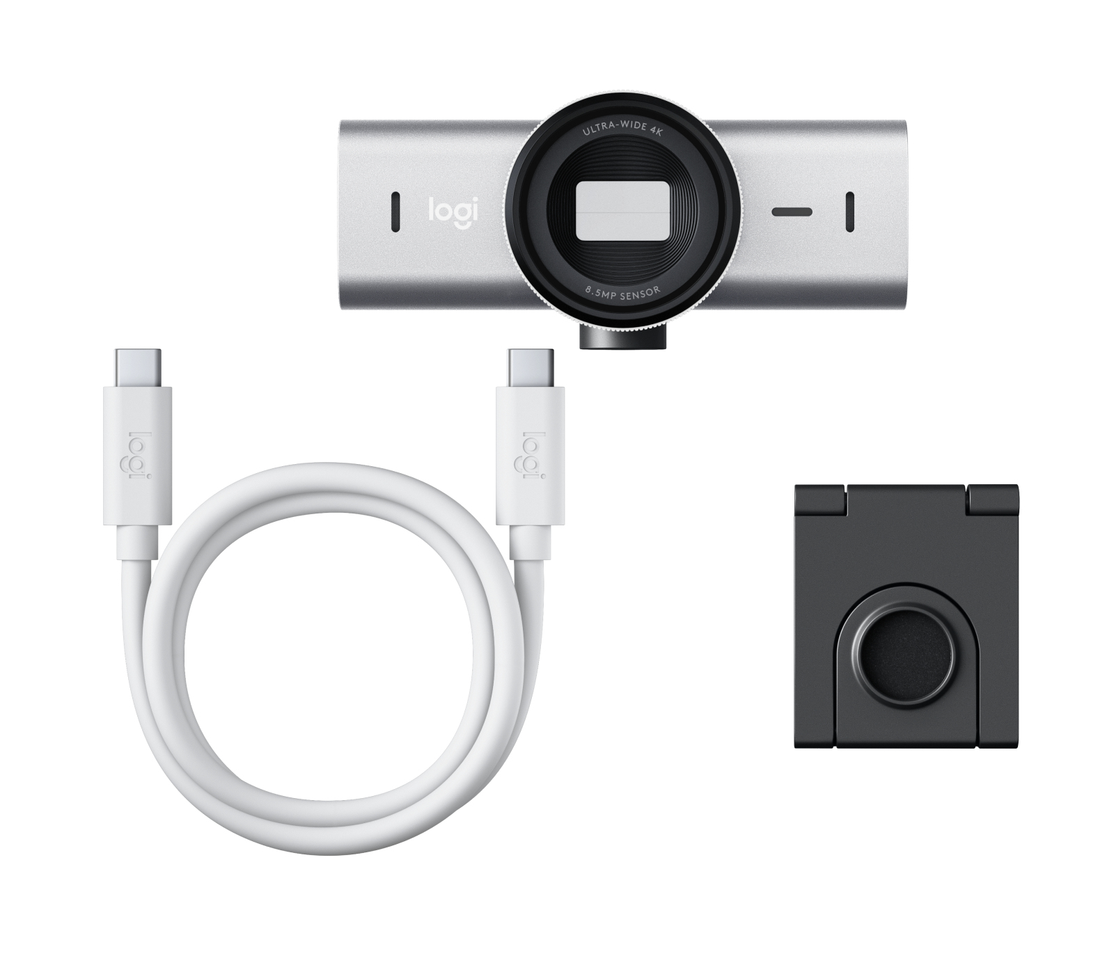 Srebrna kamera internetowa z dużą soczewką, podłączona do białego kabla i czarnego stojaka.