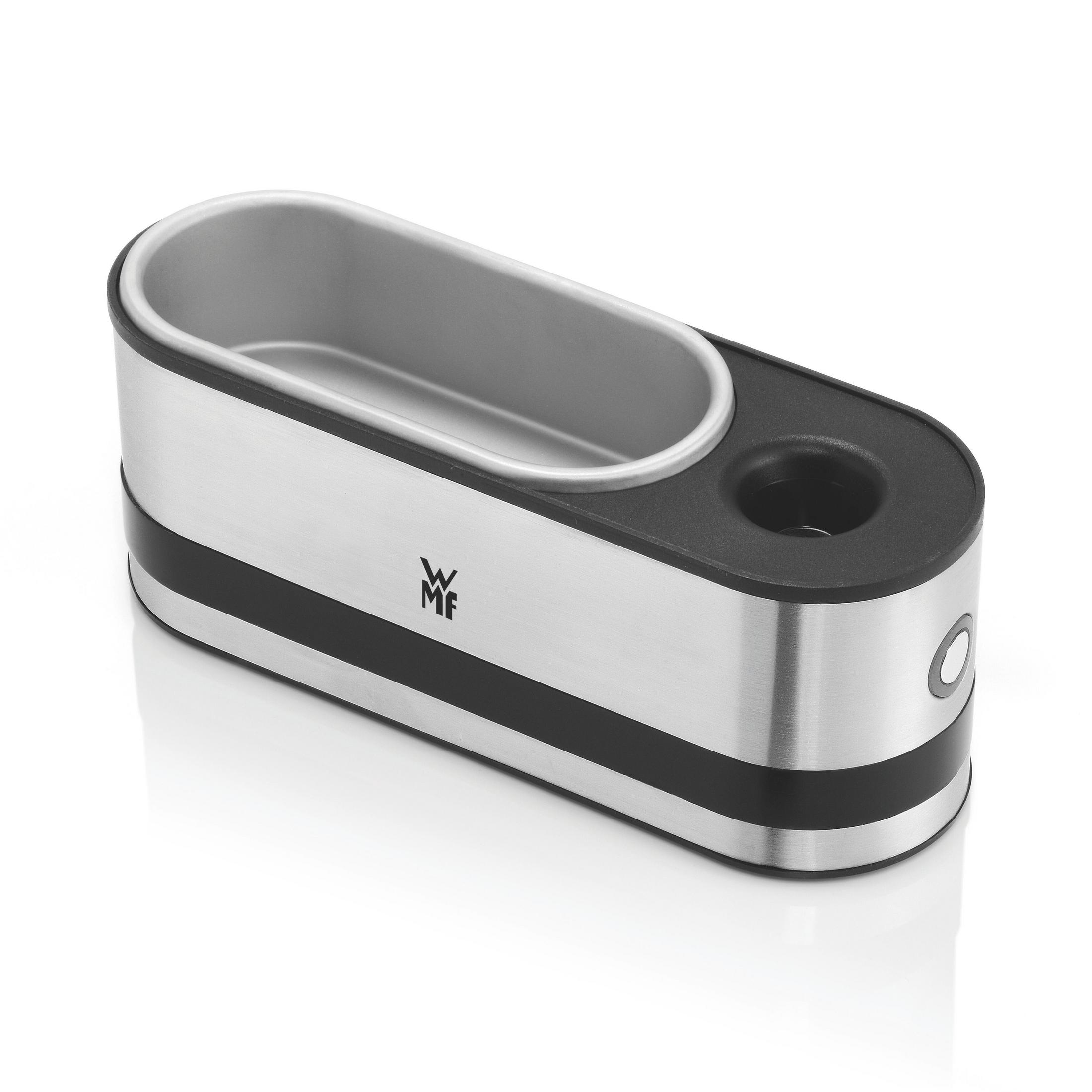 Srebrno-czarny metalowy kociołek do jajek z długą owalną powierzchnią do gotowania i małą okrągłą sekcją.