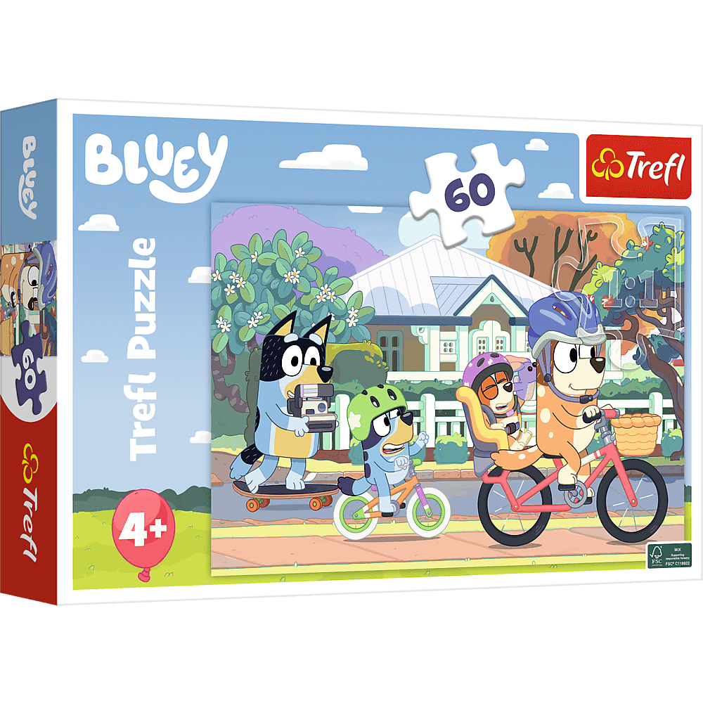 Boîte de puzzle Bluey Trefl. Chiens de dessin animé à vélo.