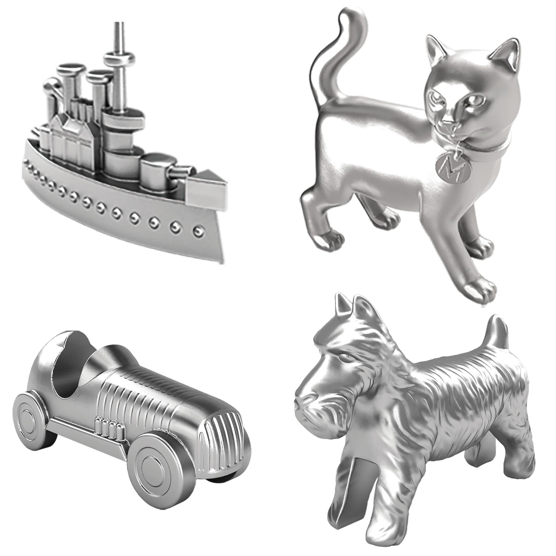 Quatre pions de Monopoly : un bateau, un chat, une voiture et un chien. Tous sont argentés.