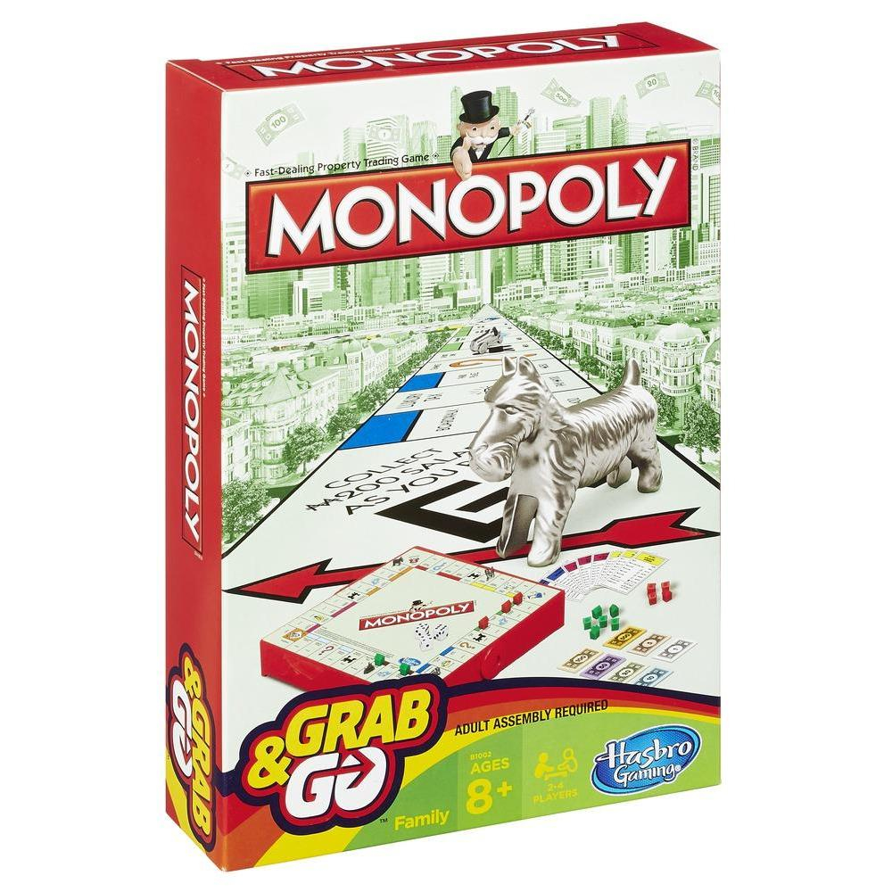 Eine Monopoly Grab & Go Brettspielbox. Die Box ist rot und hat einen Hund und Spielsteine darauf.