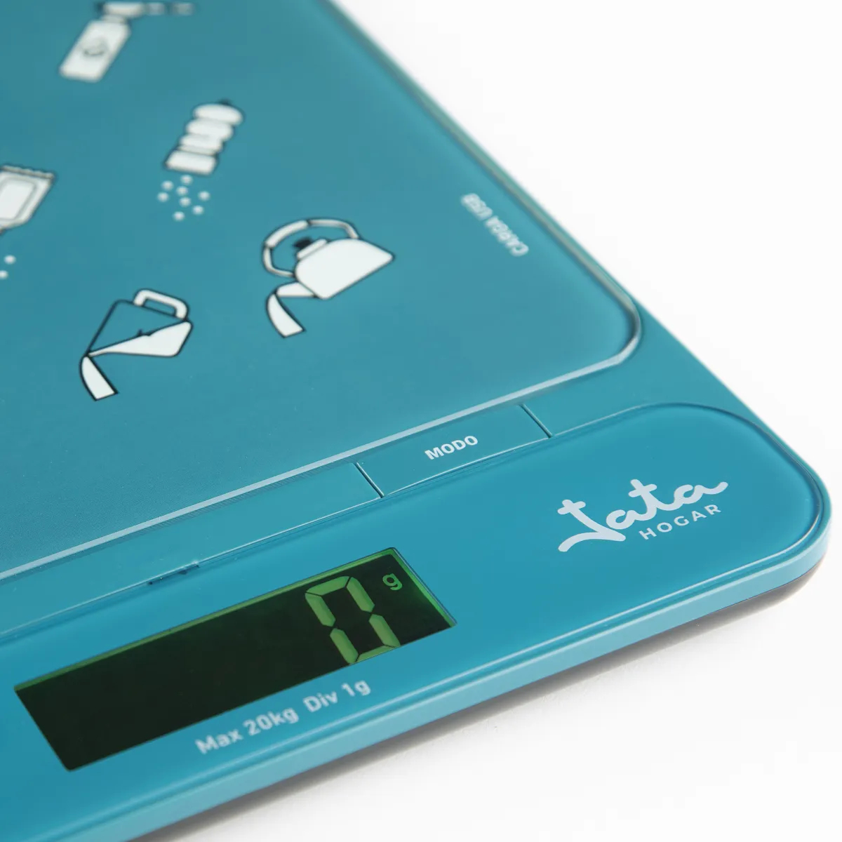 Bilancia da cucina digitale con display, icone e logo 'Jata Hogar', colore turchese, su sfondo bianco.