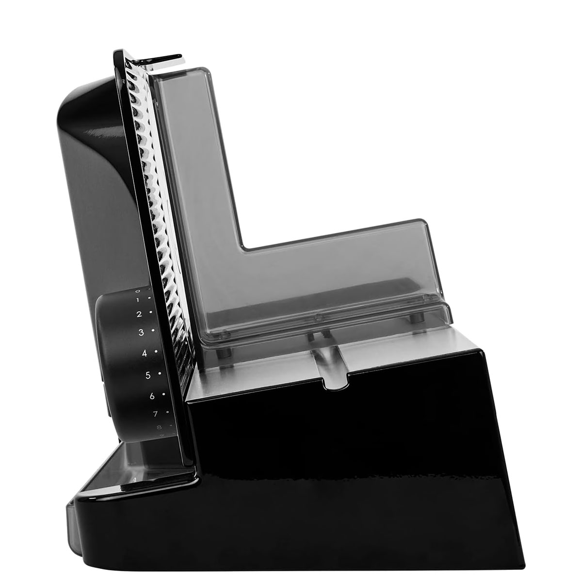 Czarne urządzenie z pokrętłem i przezroczystą osłoną. Urządzenie znajduje się na białej powierzchni.