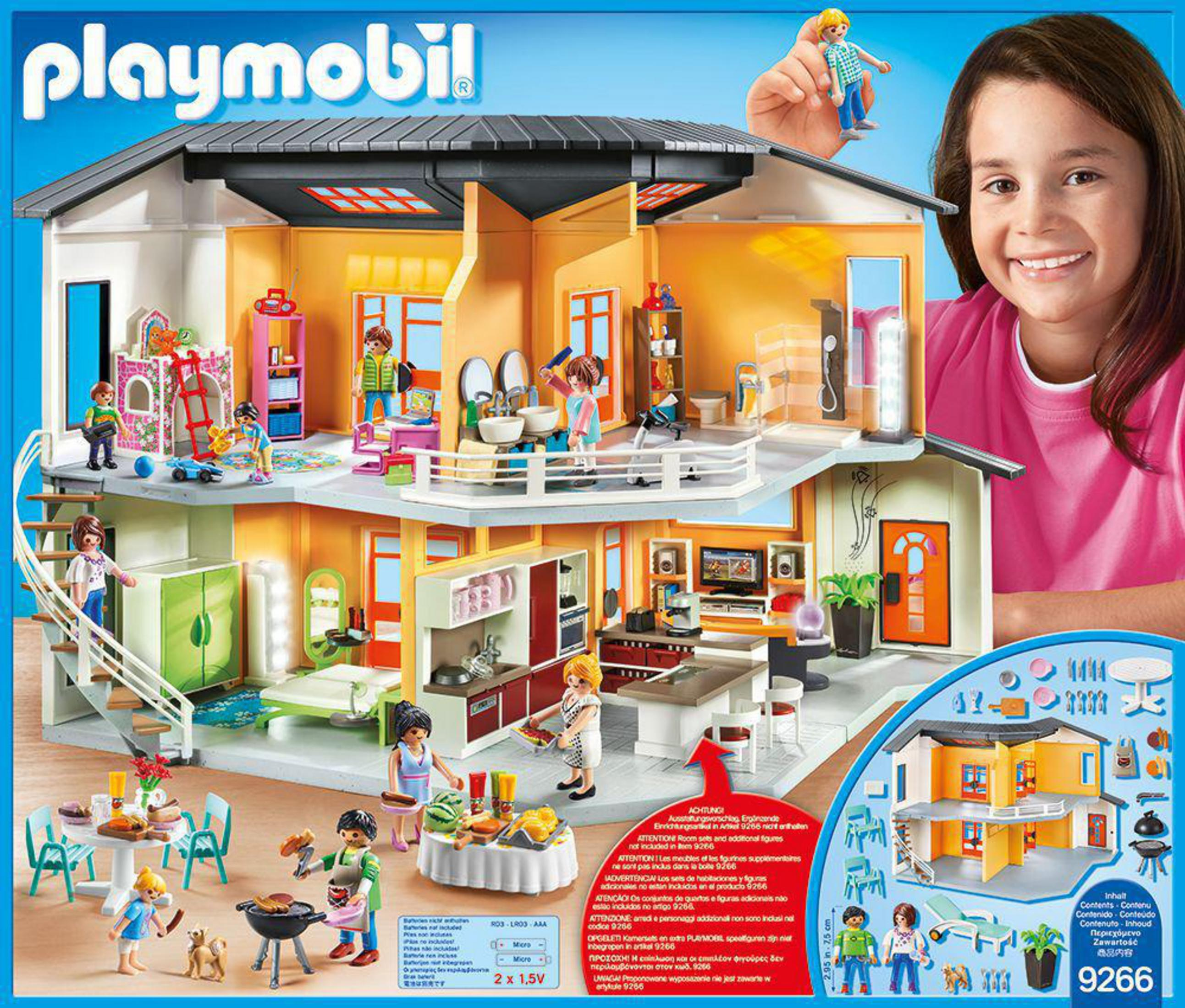 Dom Playmobil z figurkami i akcesoriami.