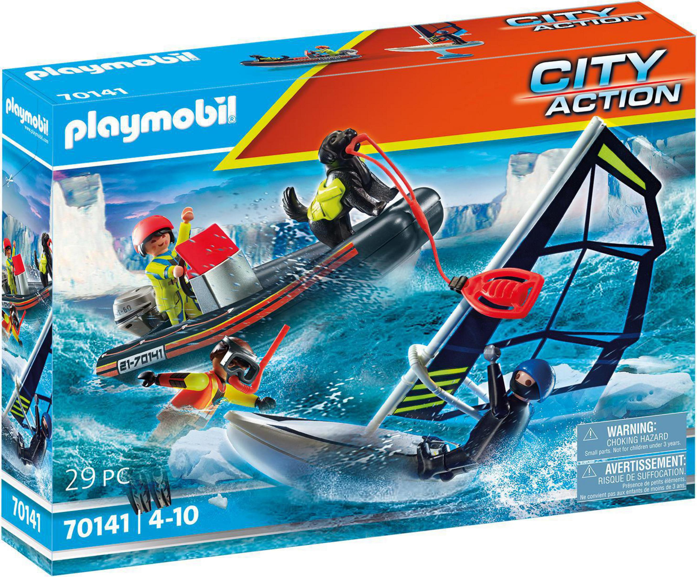 Caja Playmobil City Action. Escena de rescate con botes. Figuras, perro y windsurfista en el agua.