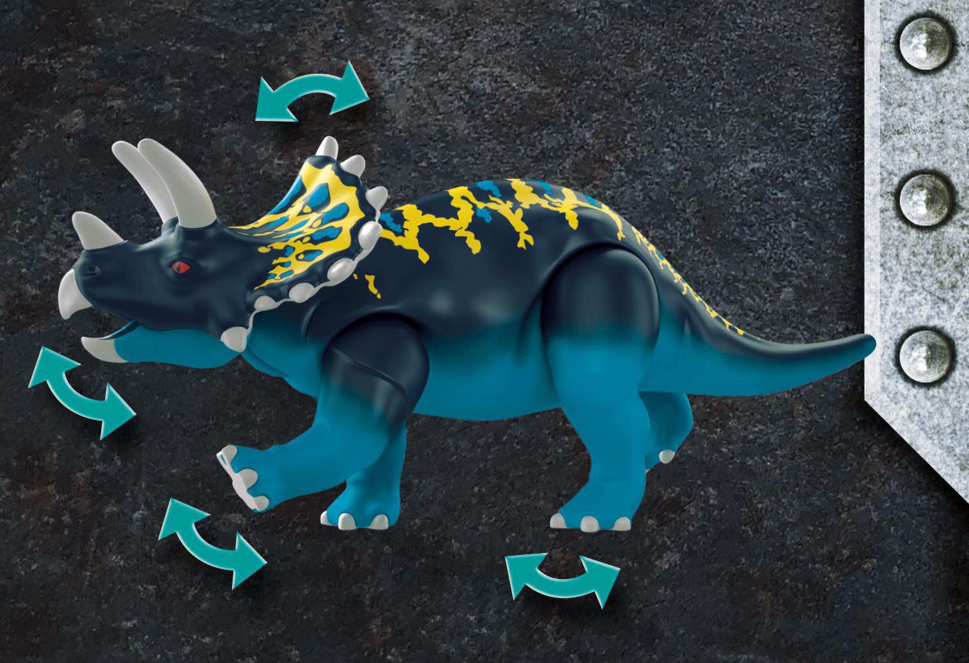 Un juguete de dinosaurio azul y negro con cuernos blancos.