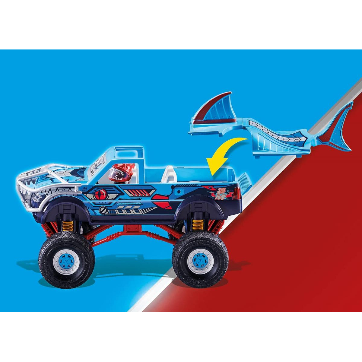 Camión monstruo Playmobil con diseño de aleta de tiburón. Camión azul sobre fondo rojo y azul.