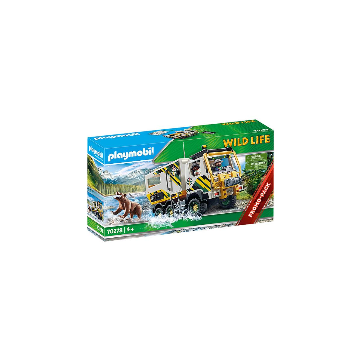 Pudełko Playmobil Wild Life pokazuje ciężarówkę z figurkami i zabawką niedźwiedzia brunatnego.