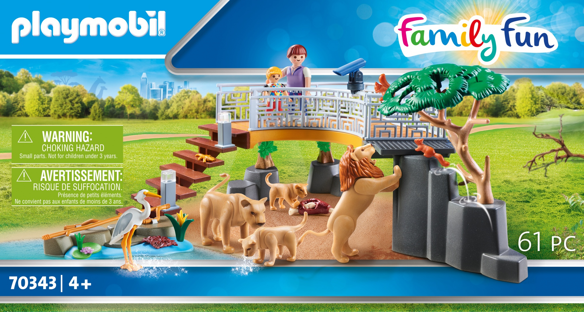 Set Playmobil Family Fun con leoni, un albero e una famiglia. Include etichette di avvertimento e il marchio di età '+4'.
