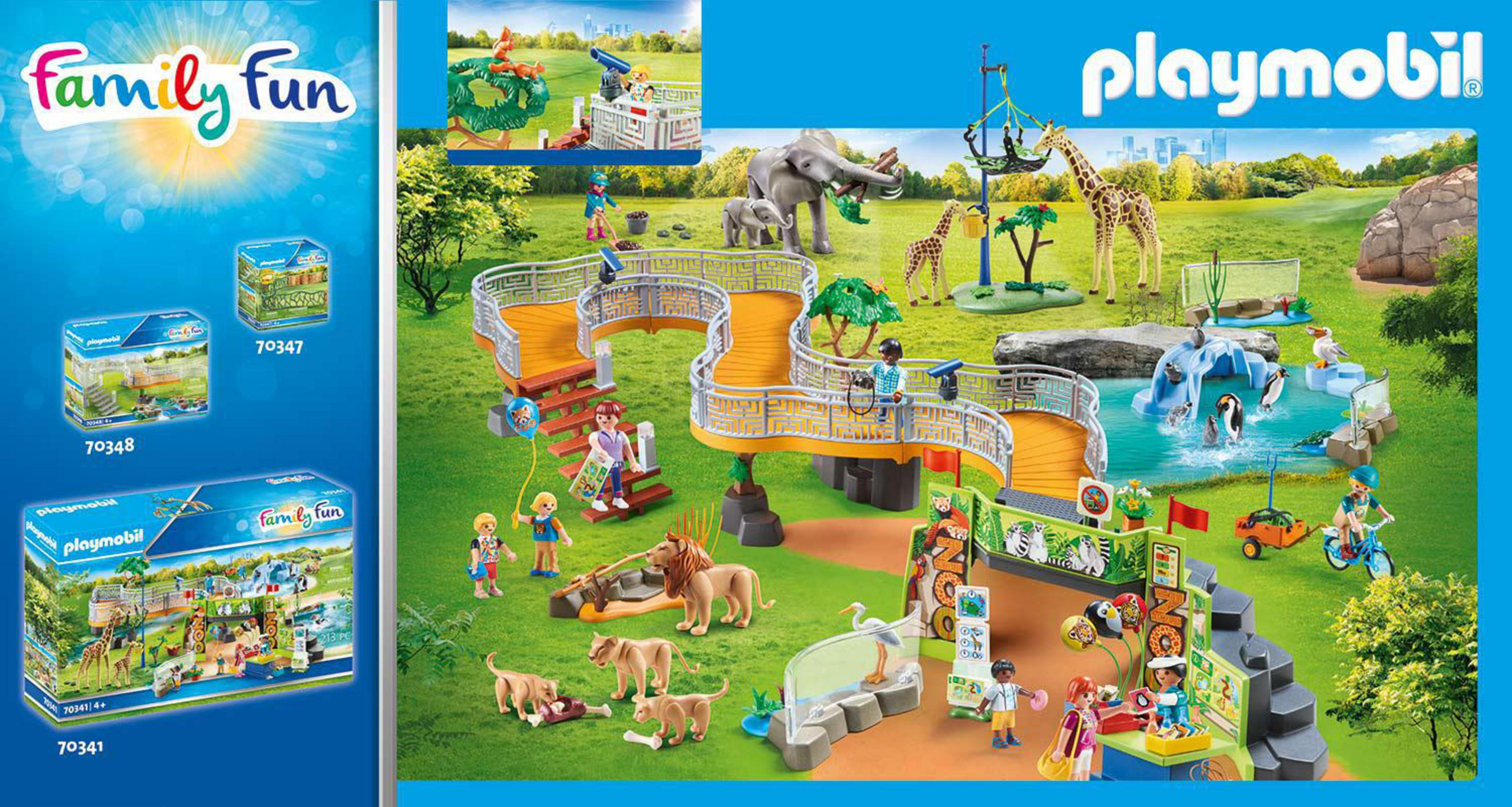 Set zoo Playmobil con vari animali, figure e strutture. Include giraffe, leoni e uno stagno.