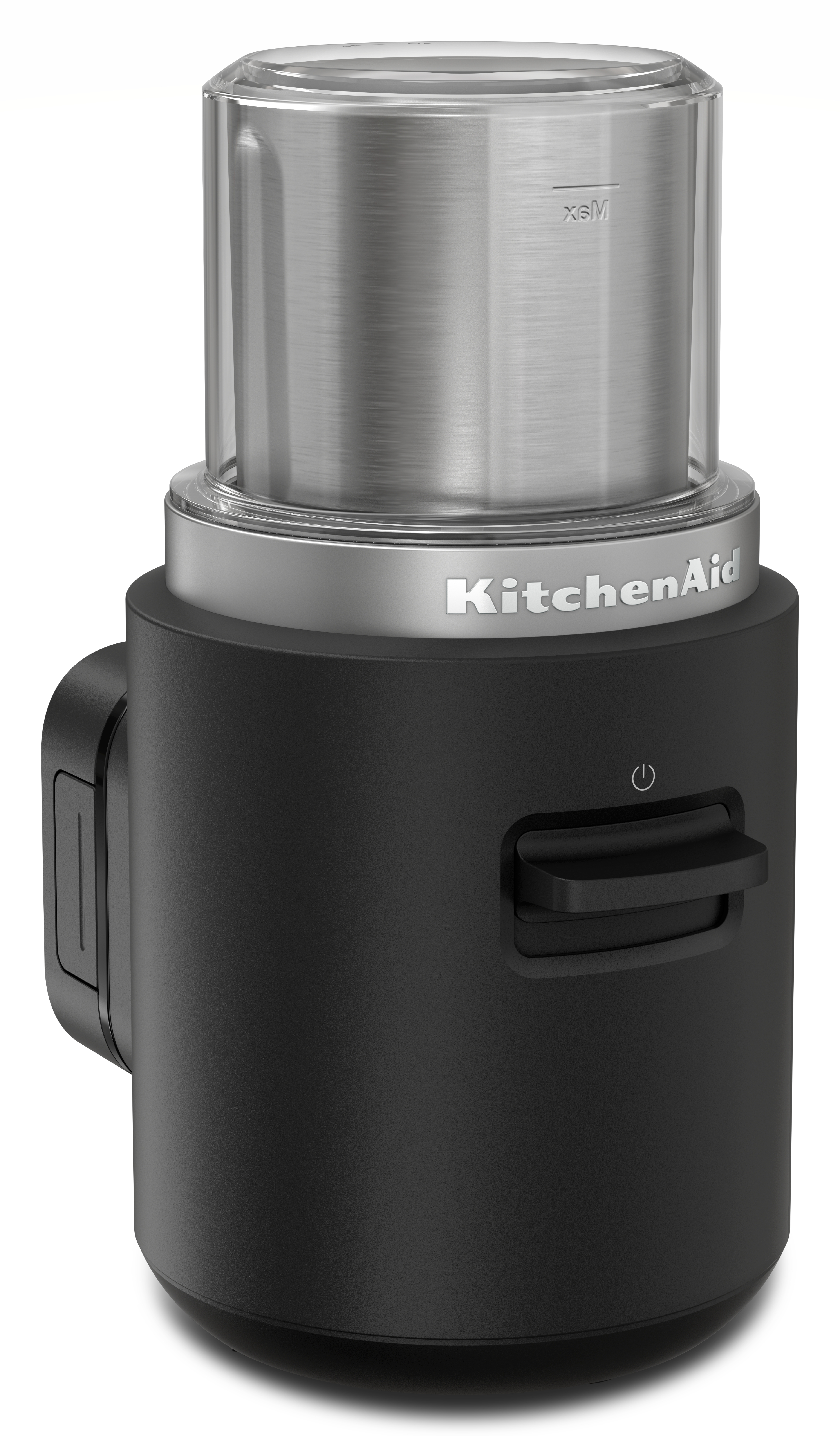 Czarny młynek do kawy KitchenAid ze srebrną górą. Czarna podstawa i boczny przycisk.