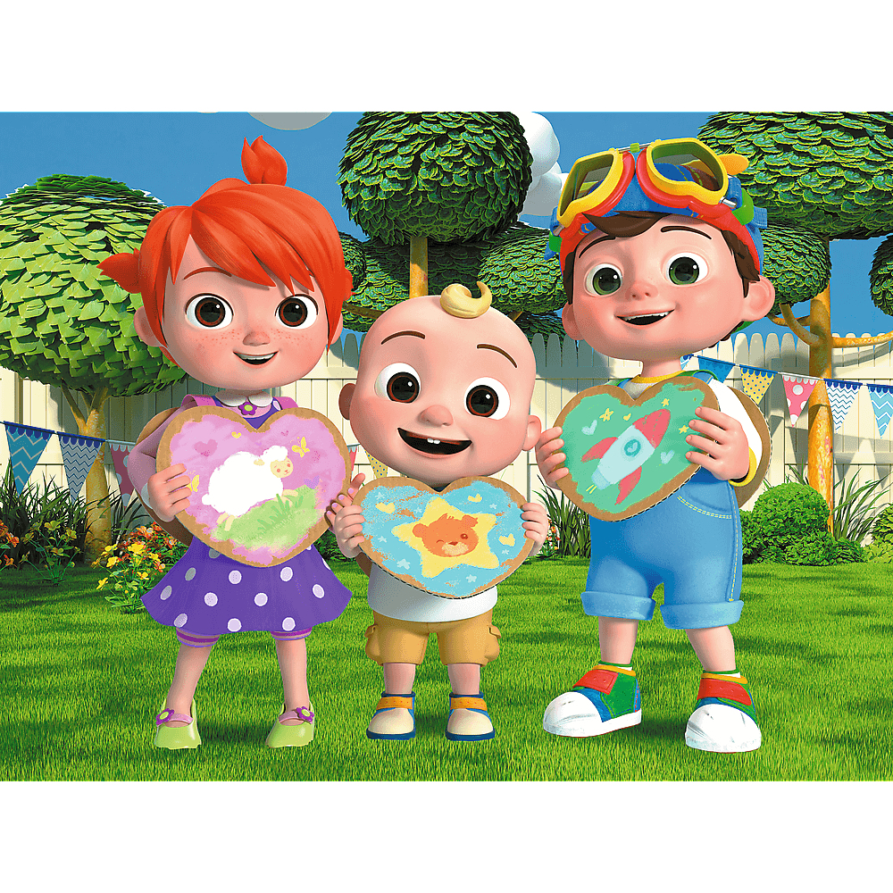Tre personaggi dei cartoni animati di Cocomelon che tengono disegni a forma di cuore sull'erba.