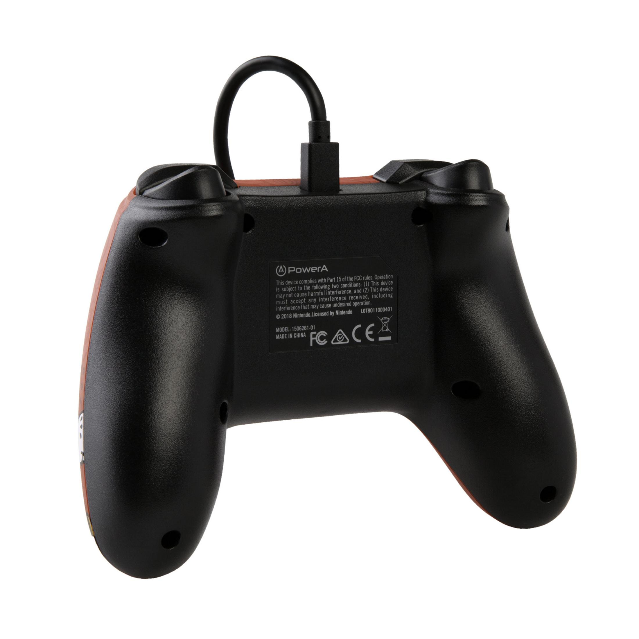 Rückansicht eines roten und schwarzen Controllers mit schwarzem Kabel, weißem Text und FCC-Logo.