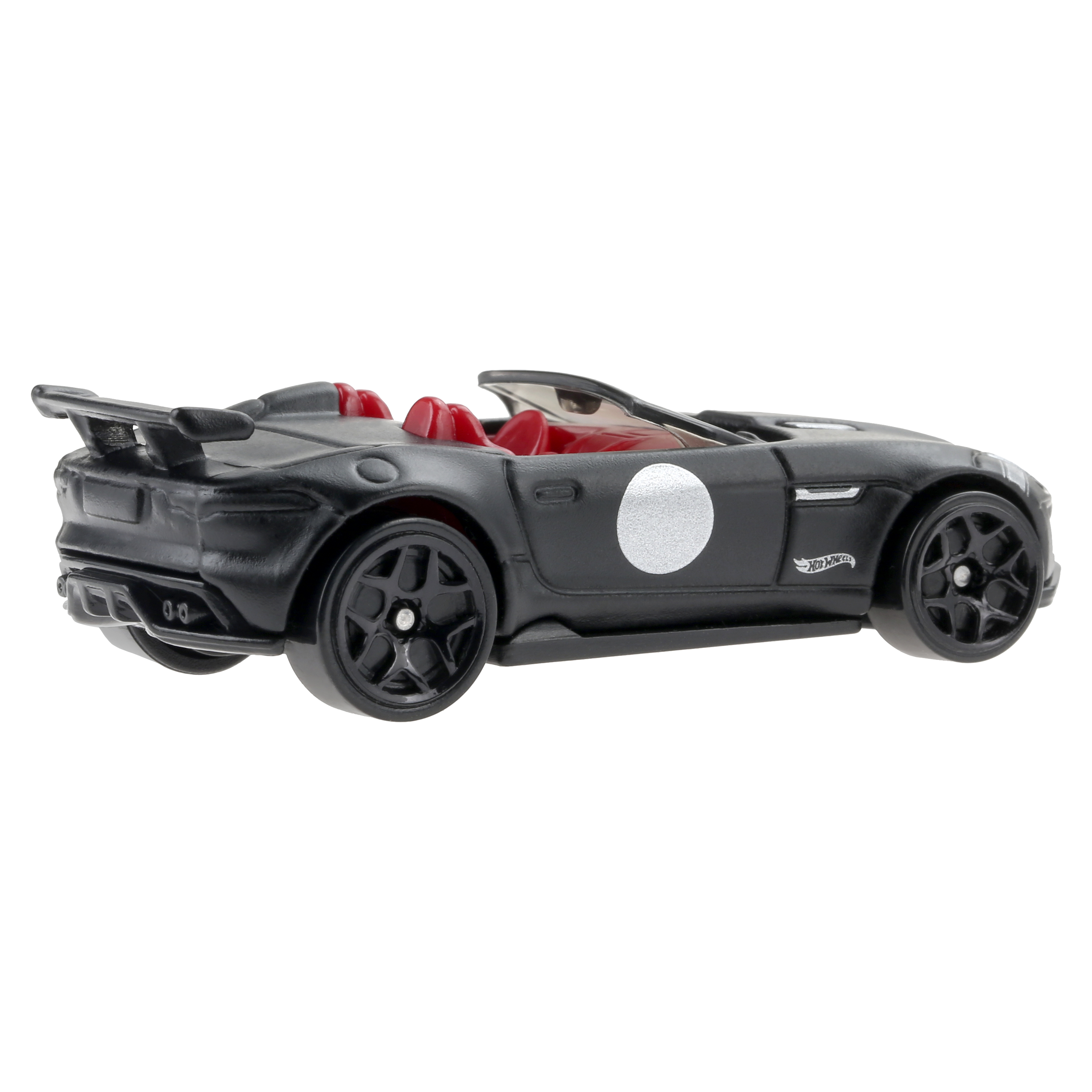 Schwarzes Spielzeugauto mit roten Sitzen, weißem Kreisdetail und Heckspoiler.