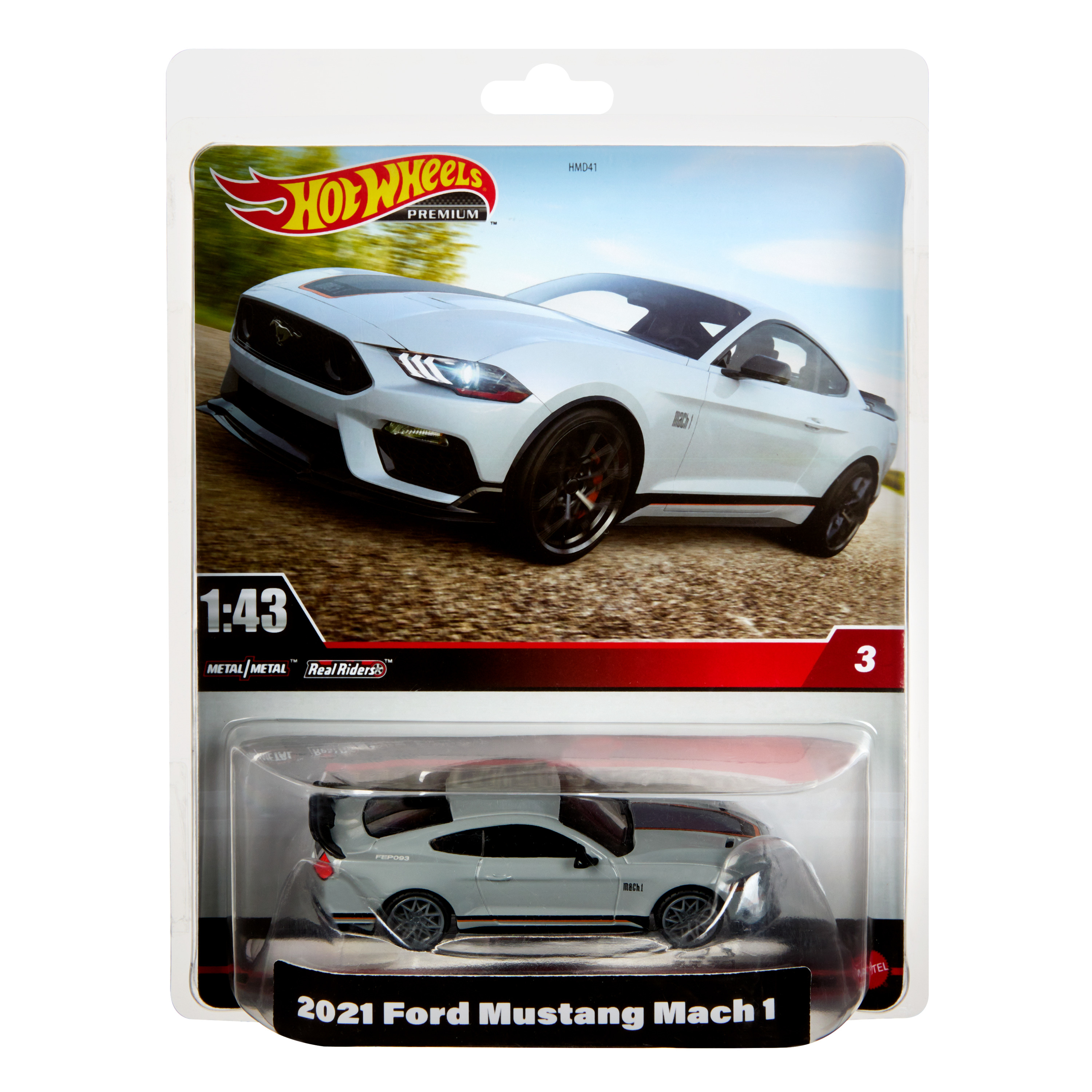 Ein Hot Wheels-Auto in einer Verpackung. Ein weißes, schwarzes und oranges Auto in einer Plastikhülle.