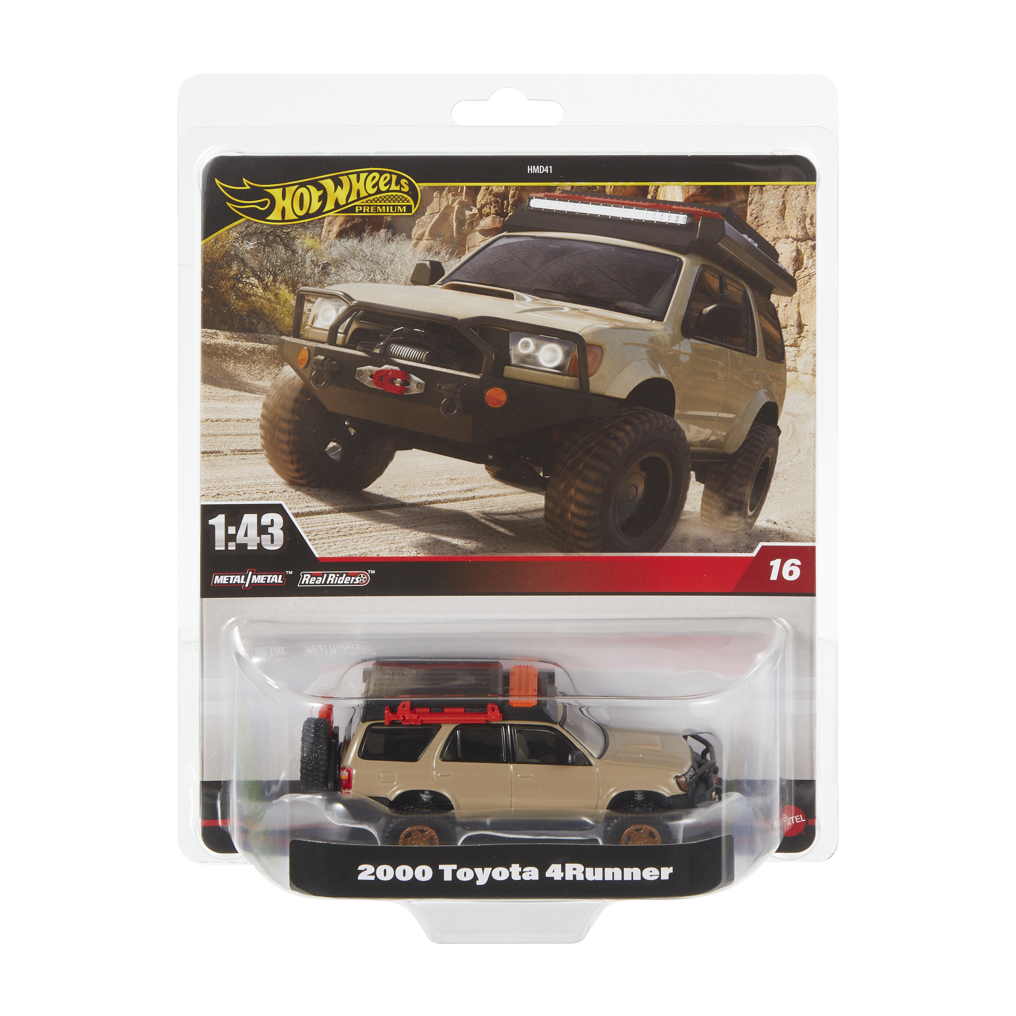 Zabawkowy samochód w opakowaniu. To beżowy SUV z czarnymi oponami i czerwonym bagażnikiem dachowym.