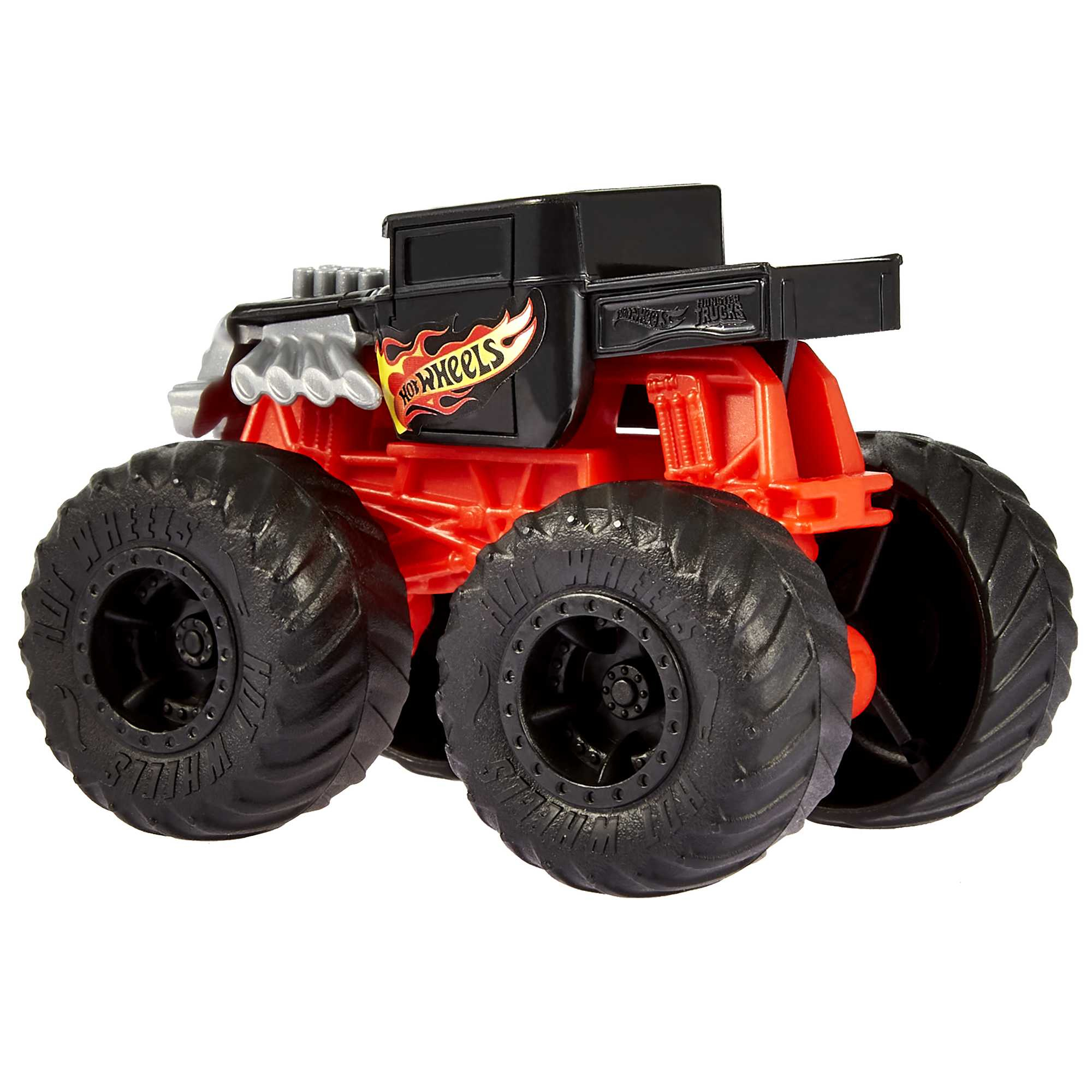 Czerwono-czarna zabawka monster truck Hot Wheels. Posiada duże czarne koła, wzór czaszki.