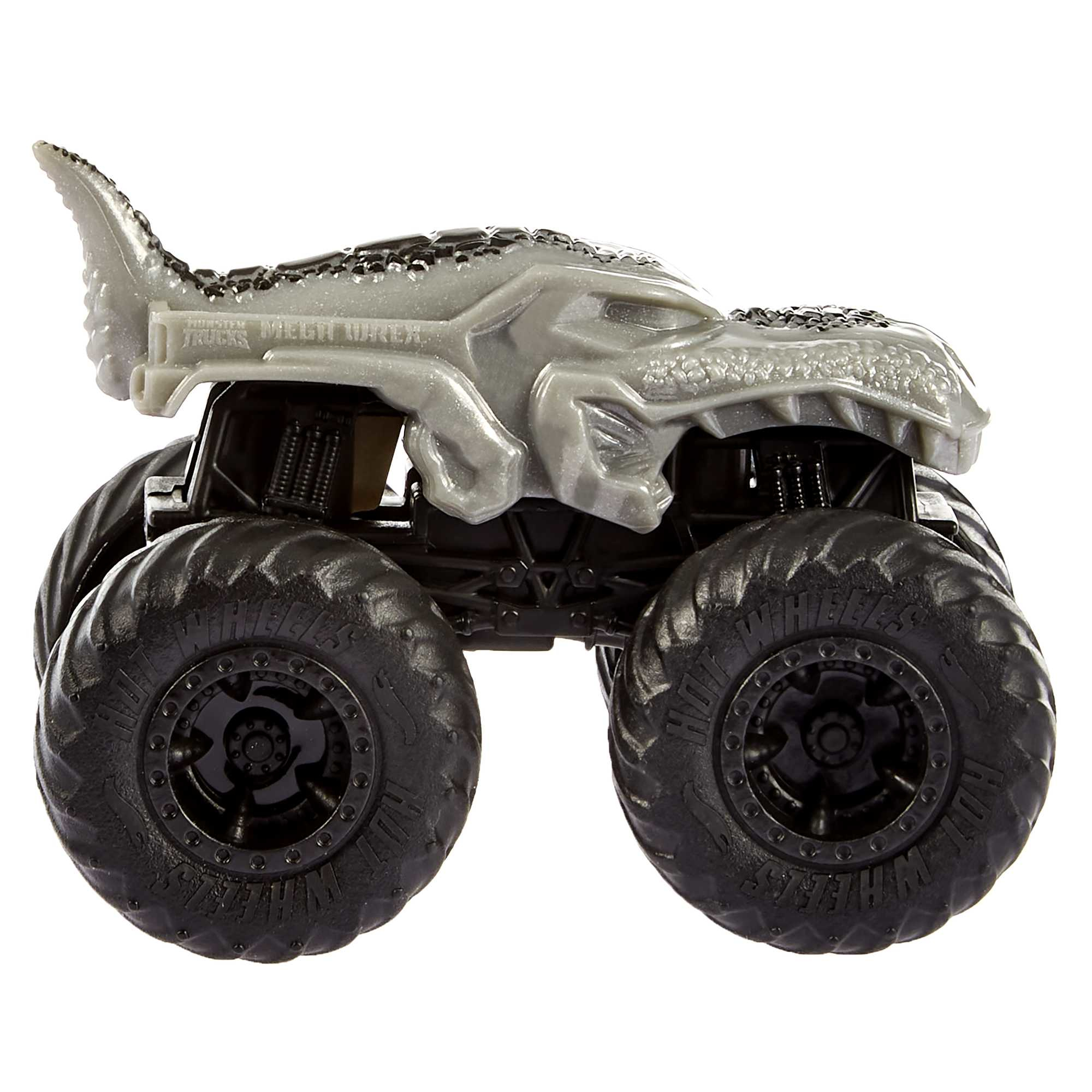 Szary monster truck Hot Wheels z głową rekina na górze.