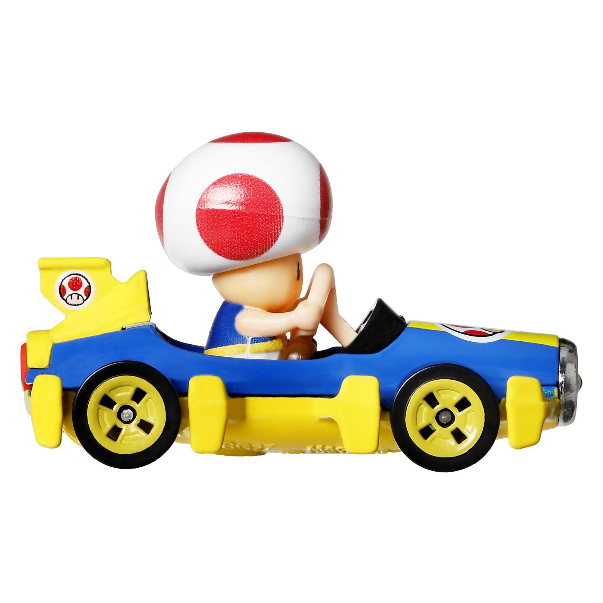 Toad w gokarcie. Gokart jest żółto-niebieski. Toad ma czerwono-białą czapkę w kształcie grzyba.