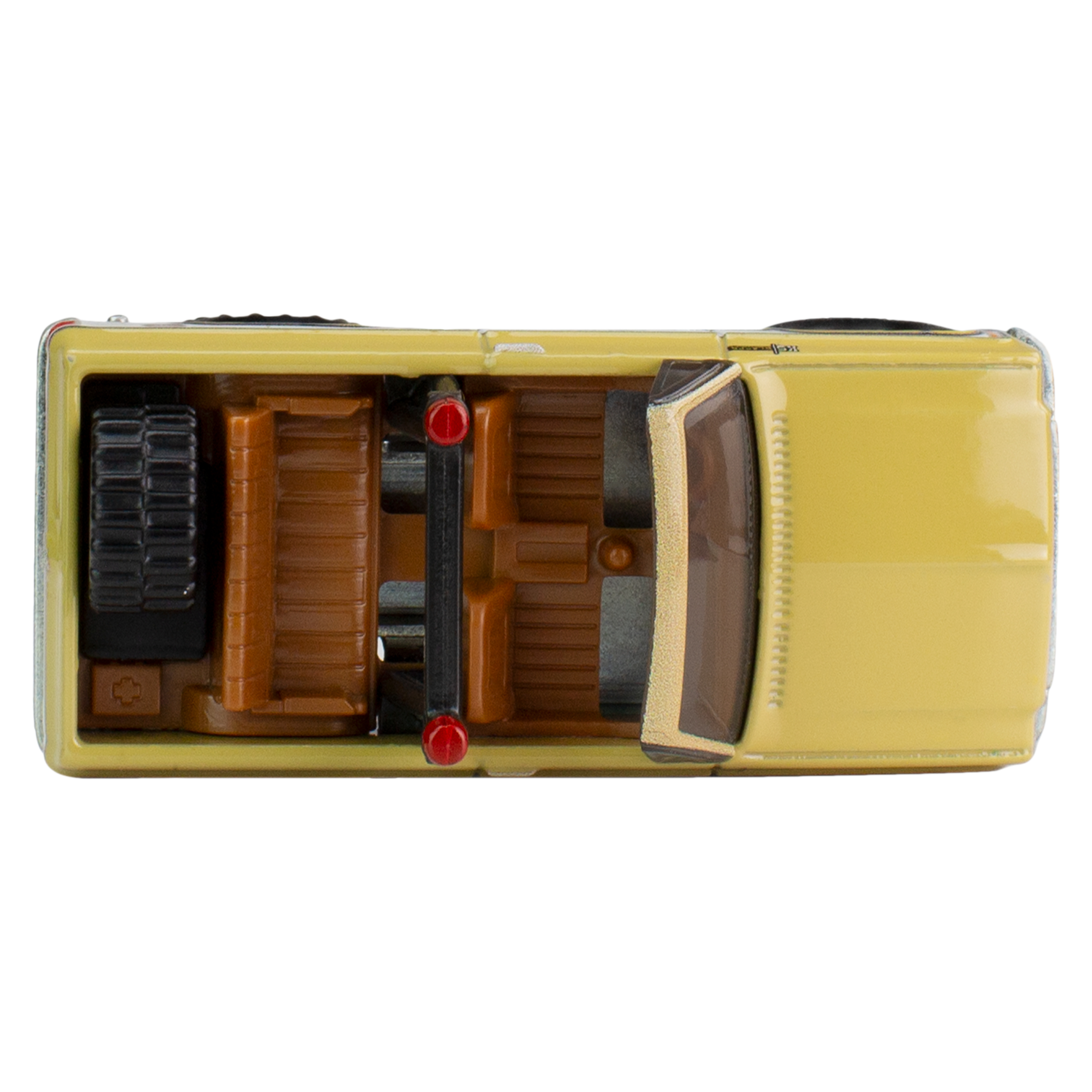 Widok z góry na zabawkę ciężarówki w kolorach żółtym i brązowym.