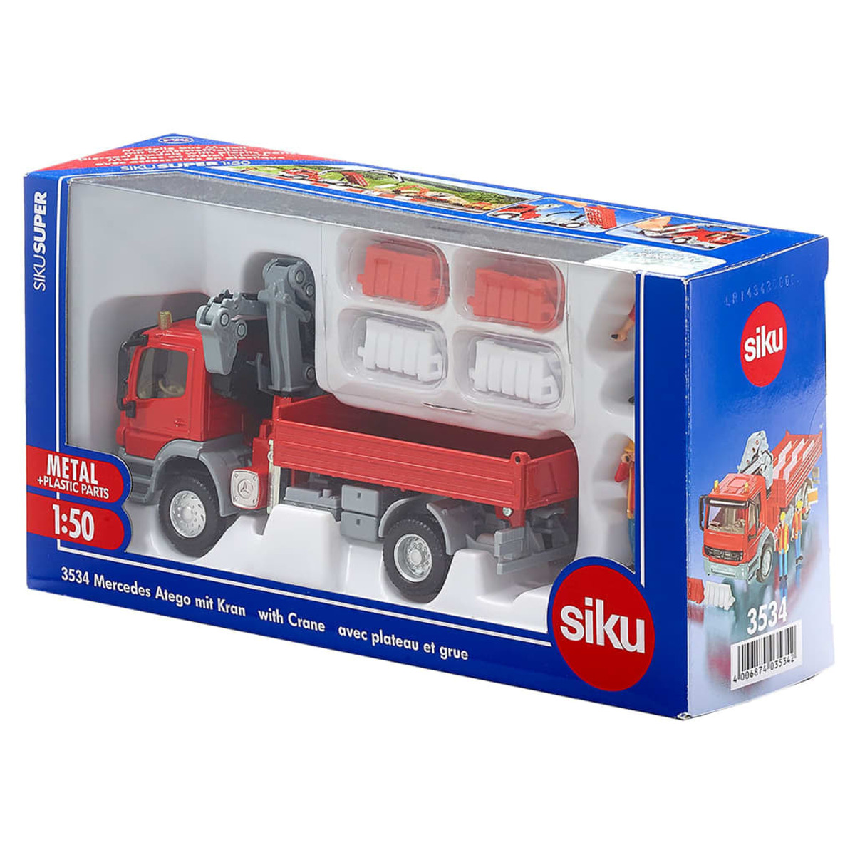 Czerwona zabawka ciężarówka z dźwigiem w pudełku.