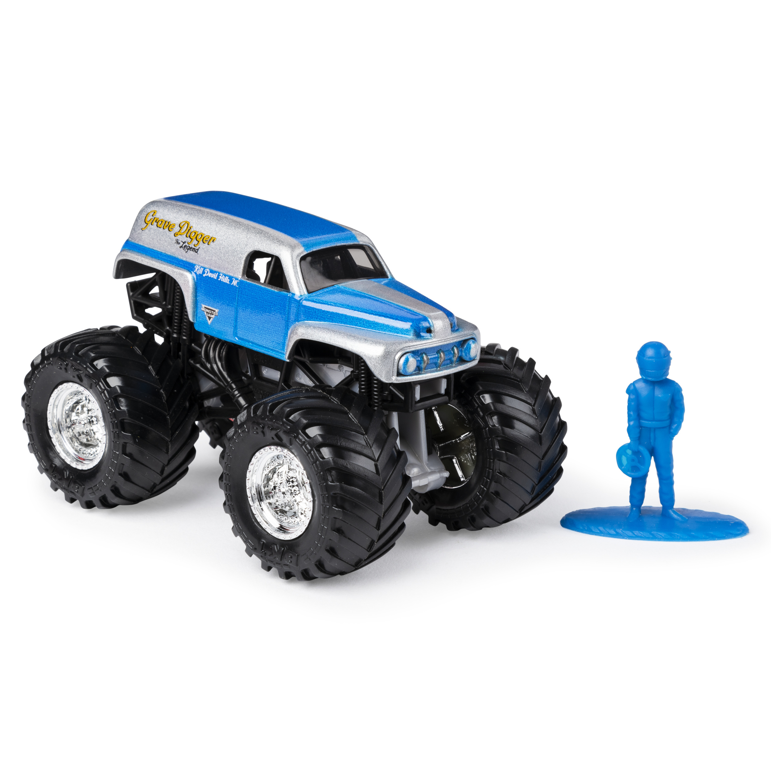 Niebiesko-srebrna zabawka typu monster truck z niebieską figurką. Białe tło.