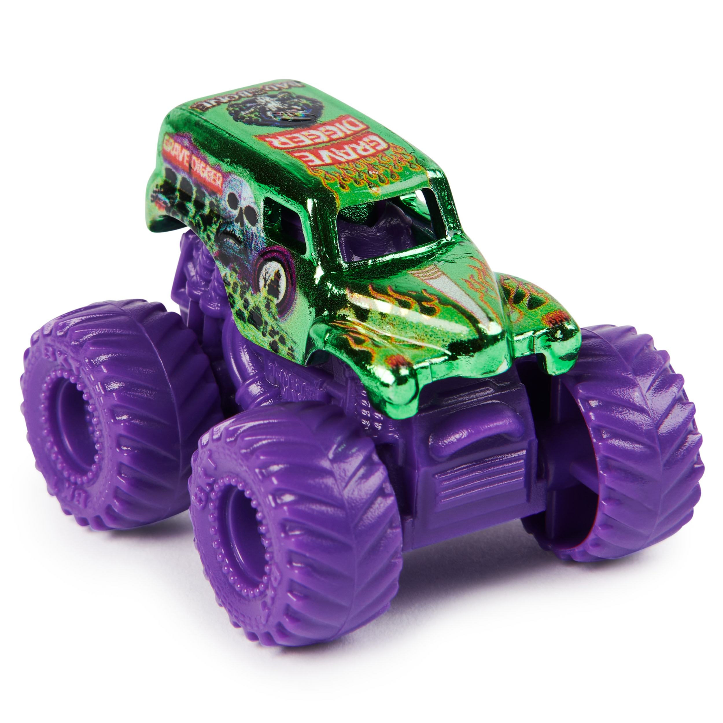 Un camión monstruo Grave Digger de juguete con ruedas moradas y una parte superior verde con calaveras y llamas.