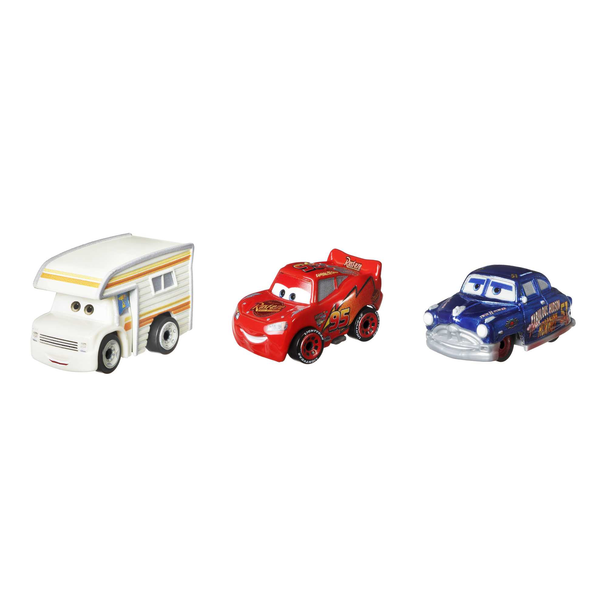 Tres coches de juguete: una caravana blanca, un coche de carreras rojo y un coche clásico azul.