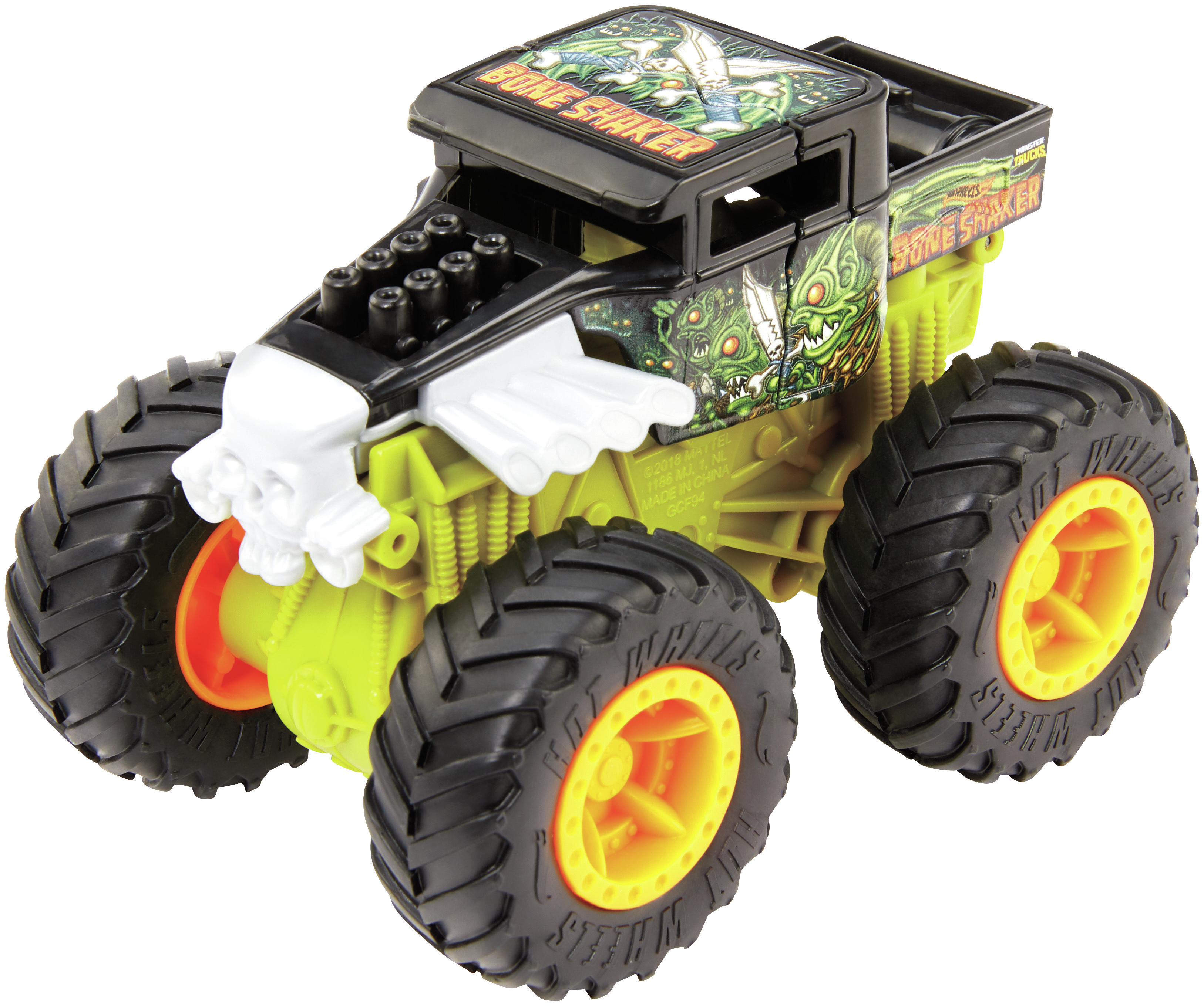 Ein Hot Wheels Monster Truck Spielzeug mit schwarzem und grünem Design und gelben Rädern.