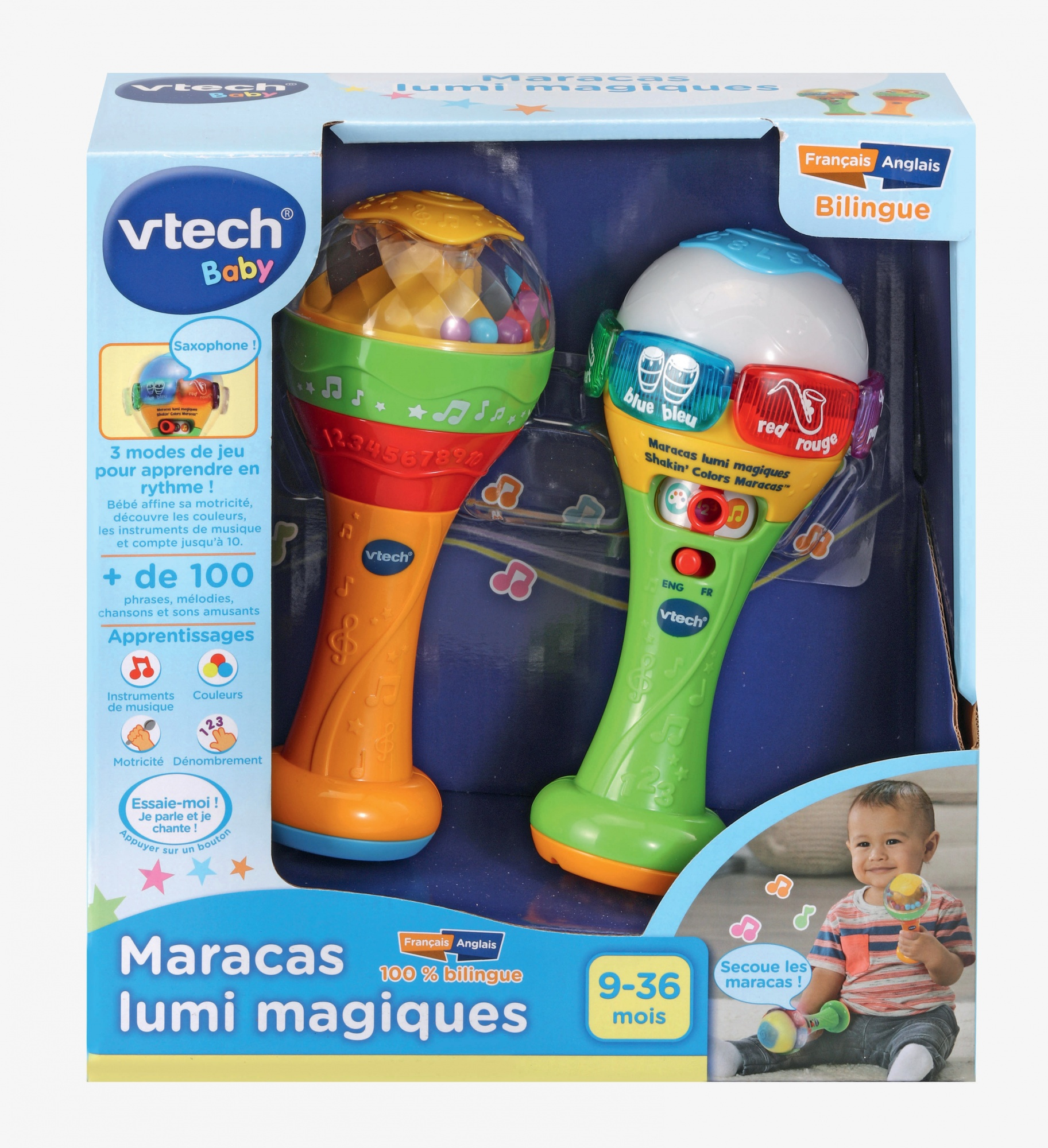 Zwei Rasseln in einer Box. Die Box zeigt die Spielzeuge und ein Baby. Zweisprachige Etiketten.