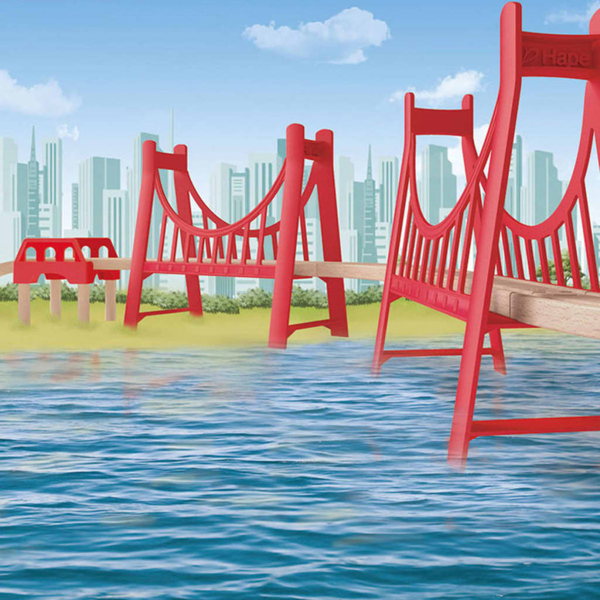 Czerwone drewniane zabawki mostowe na niebieskiej powierzchni wody, z tłem krajobrazu miejskiego i błękitnego nieba.