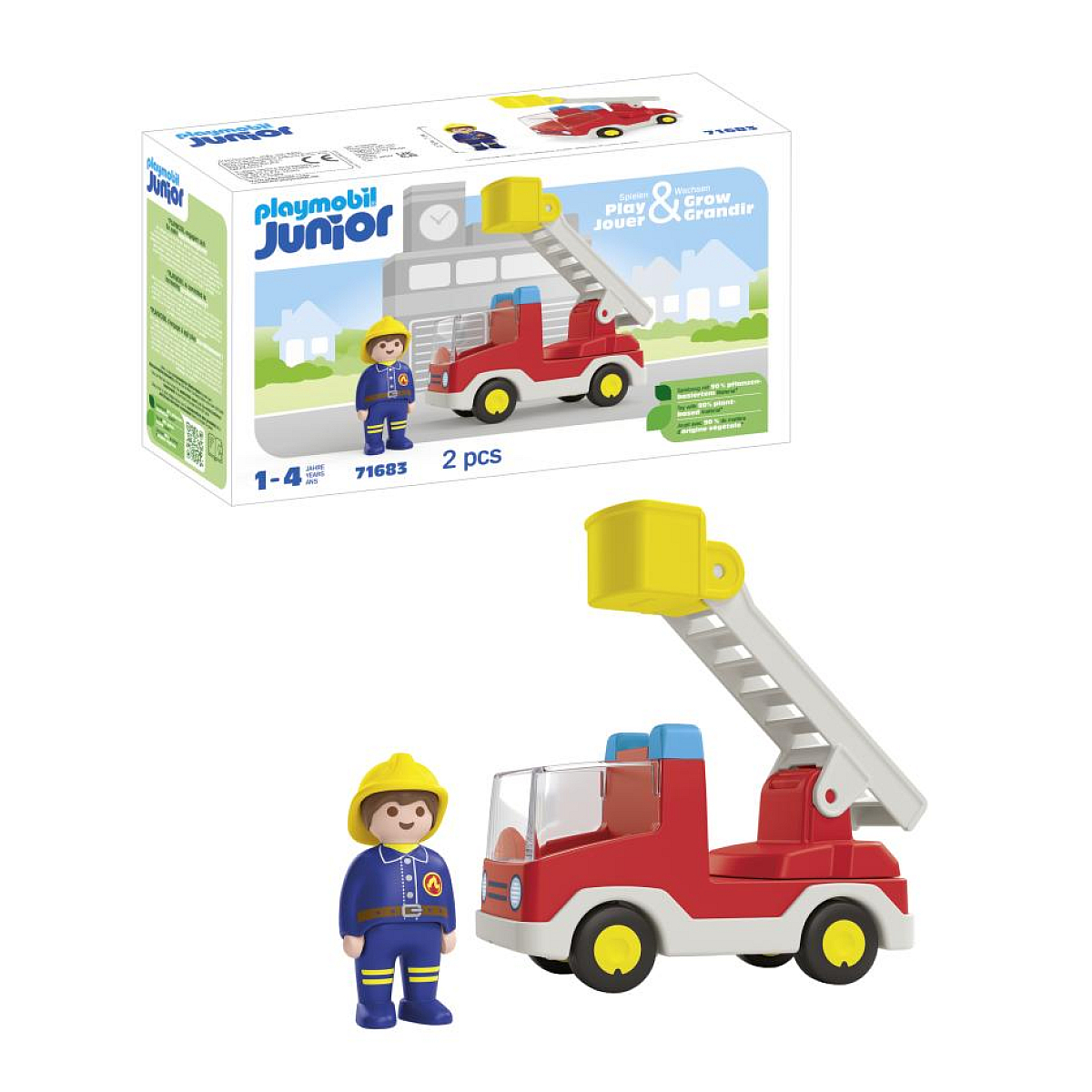 Zabawkowa straż pożarna i figurka strażaka na białym tle, z pudełkiem.