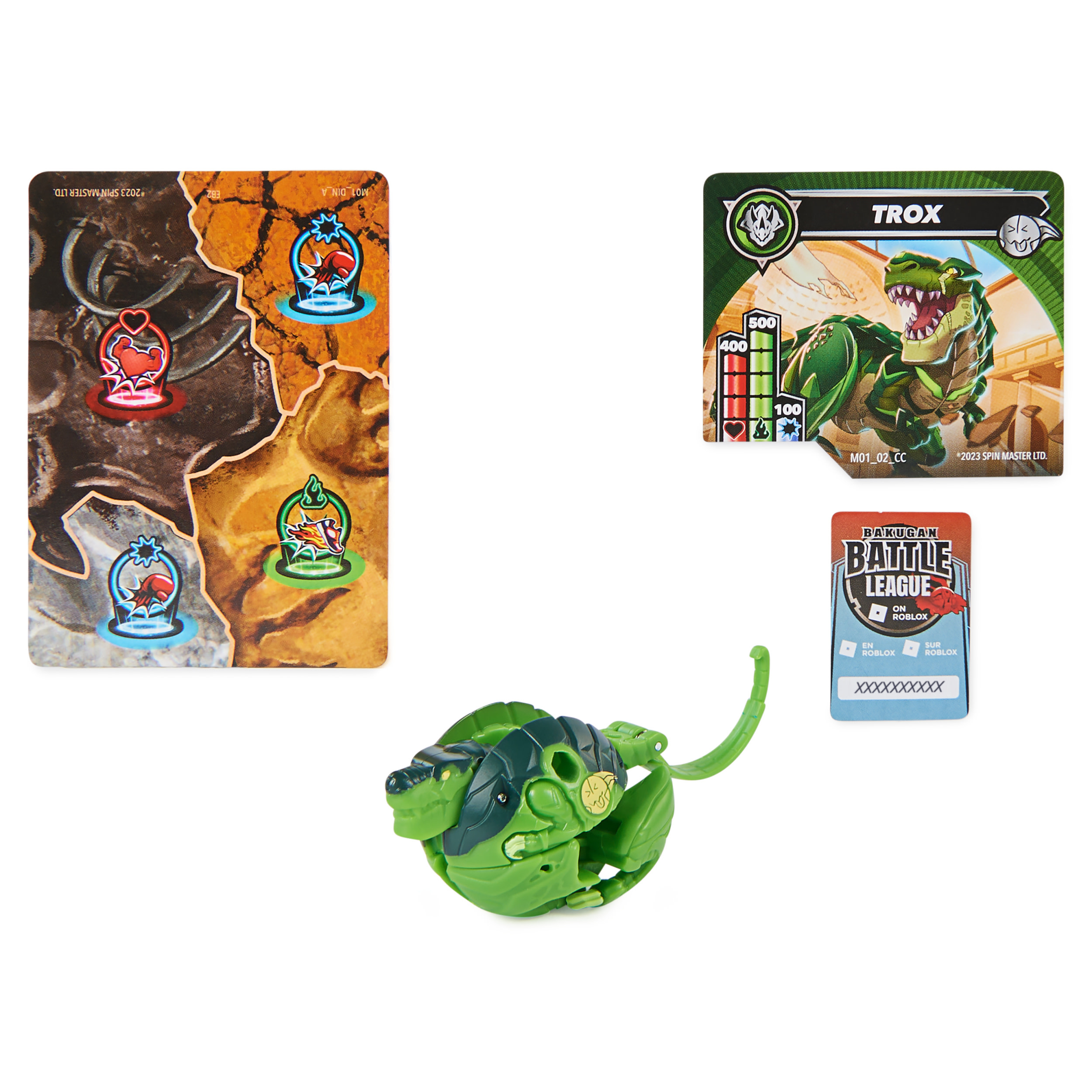Karty Bakugan, zielona figurka Bakugan i karta. Karty mają różne kolorowe obrazy.