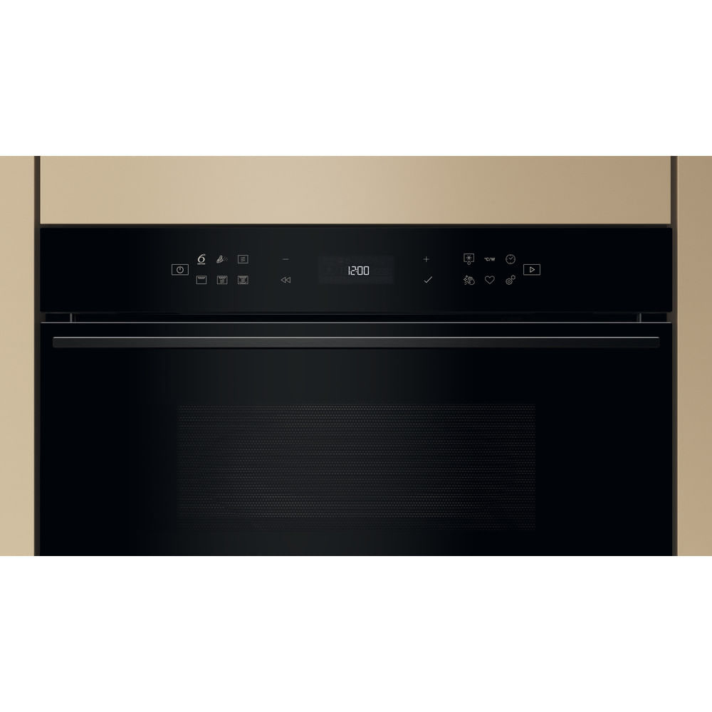 Zwart ovenbedieningspaneel met een digitale klok die 12:00 weergeeft. De oven is zwart.