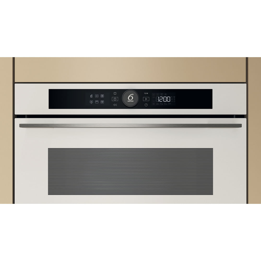 Forno a incasso bianco con display digitale nero e ventilazione a strisce orizzontali sottostante.