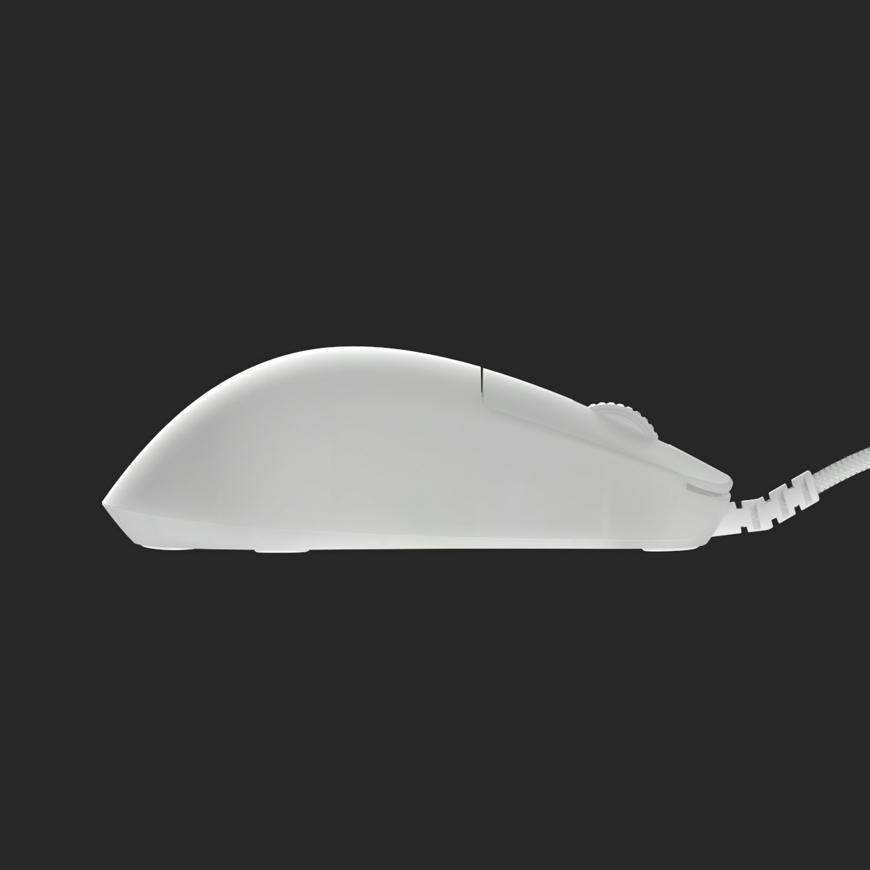 White computer mouse with a cord. Side view on a dark background.