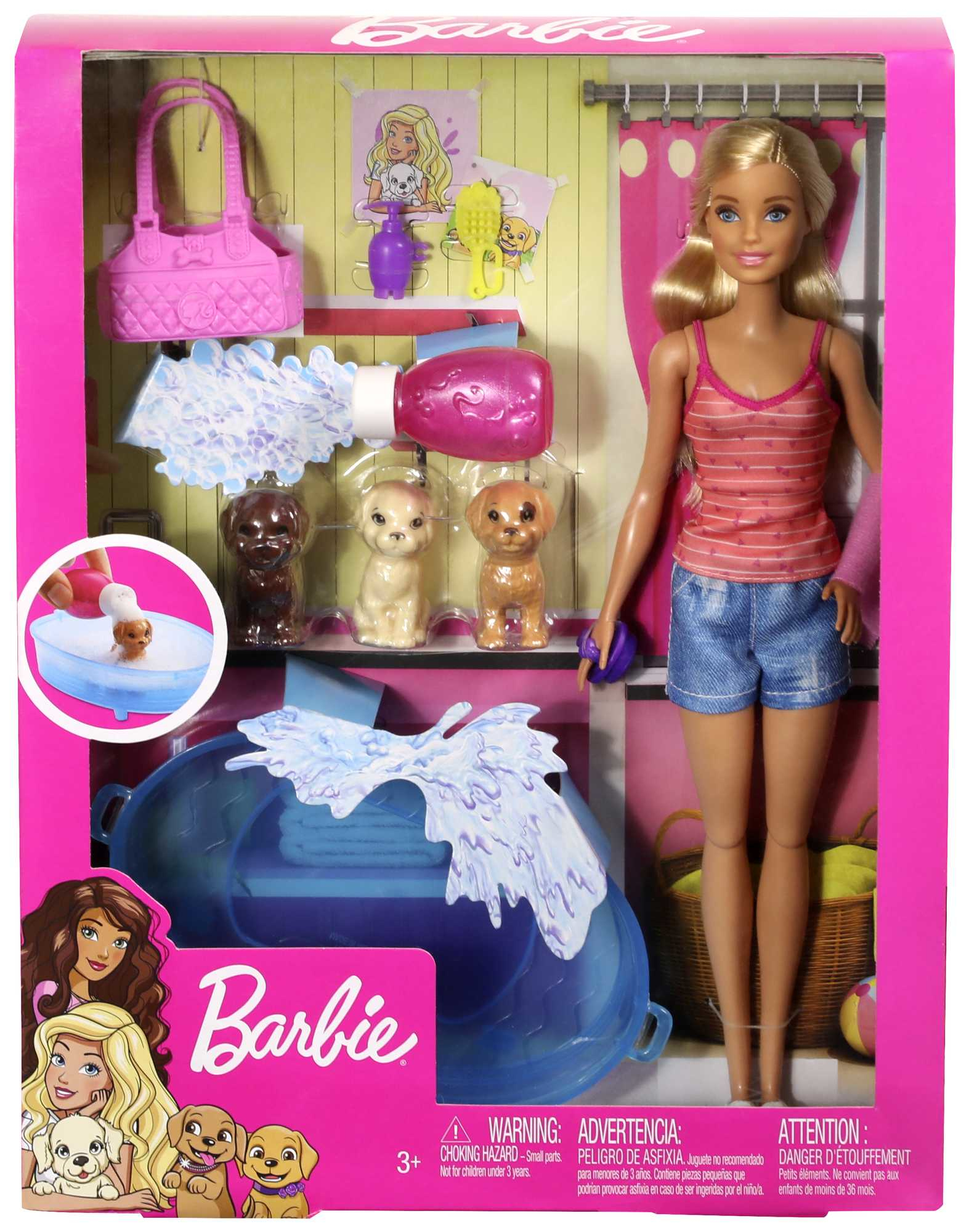 Caja de muñeca Barbie con Barbie y accesorios, incluyendo cachorros, baño y un bolso rosa.
